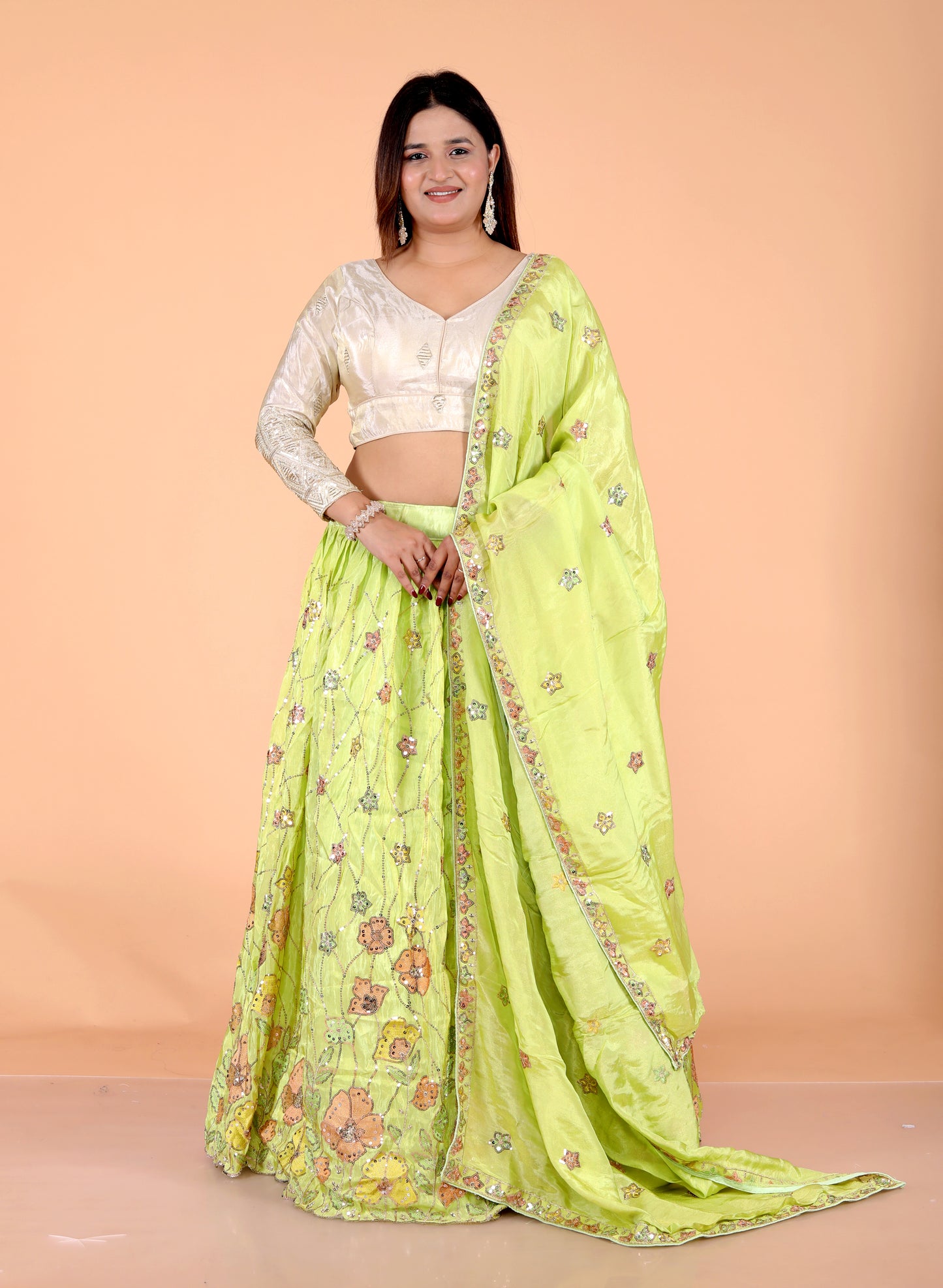 TISSUE APPLIQUE SEQUENCE WORK PARROT GREEN LEHNGA BY SKFBHOLUBHAI