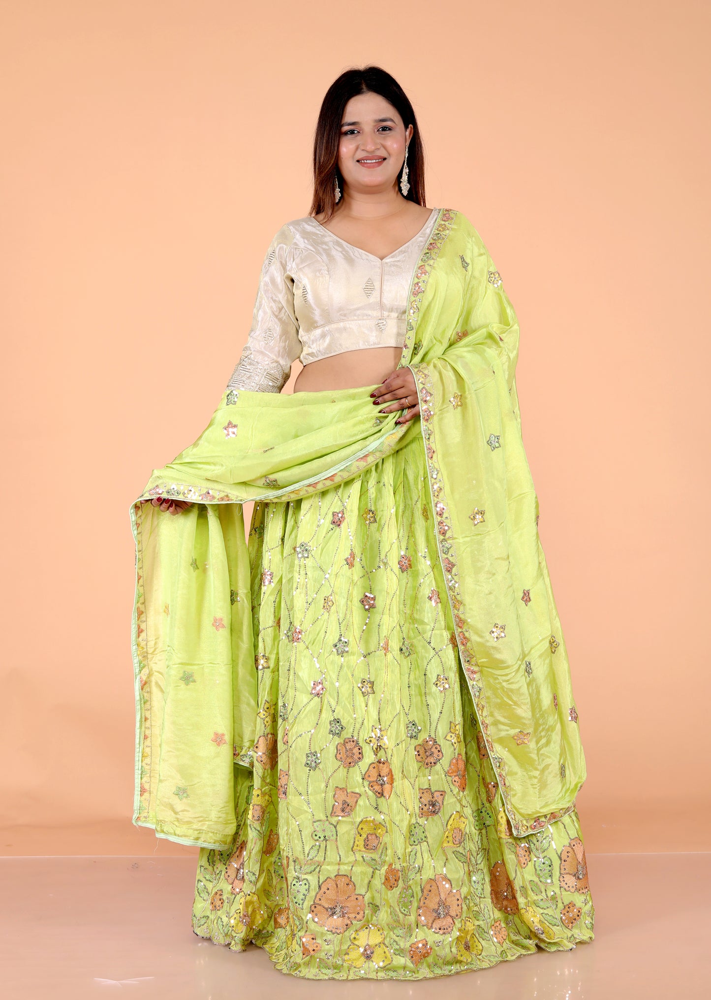 TISSUE APPLIQUE SEQUENCE WORK PARROT GREEN LEHNGA BY SKFBHOLUBHAI