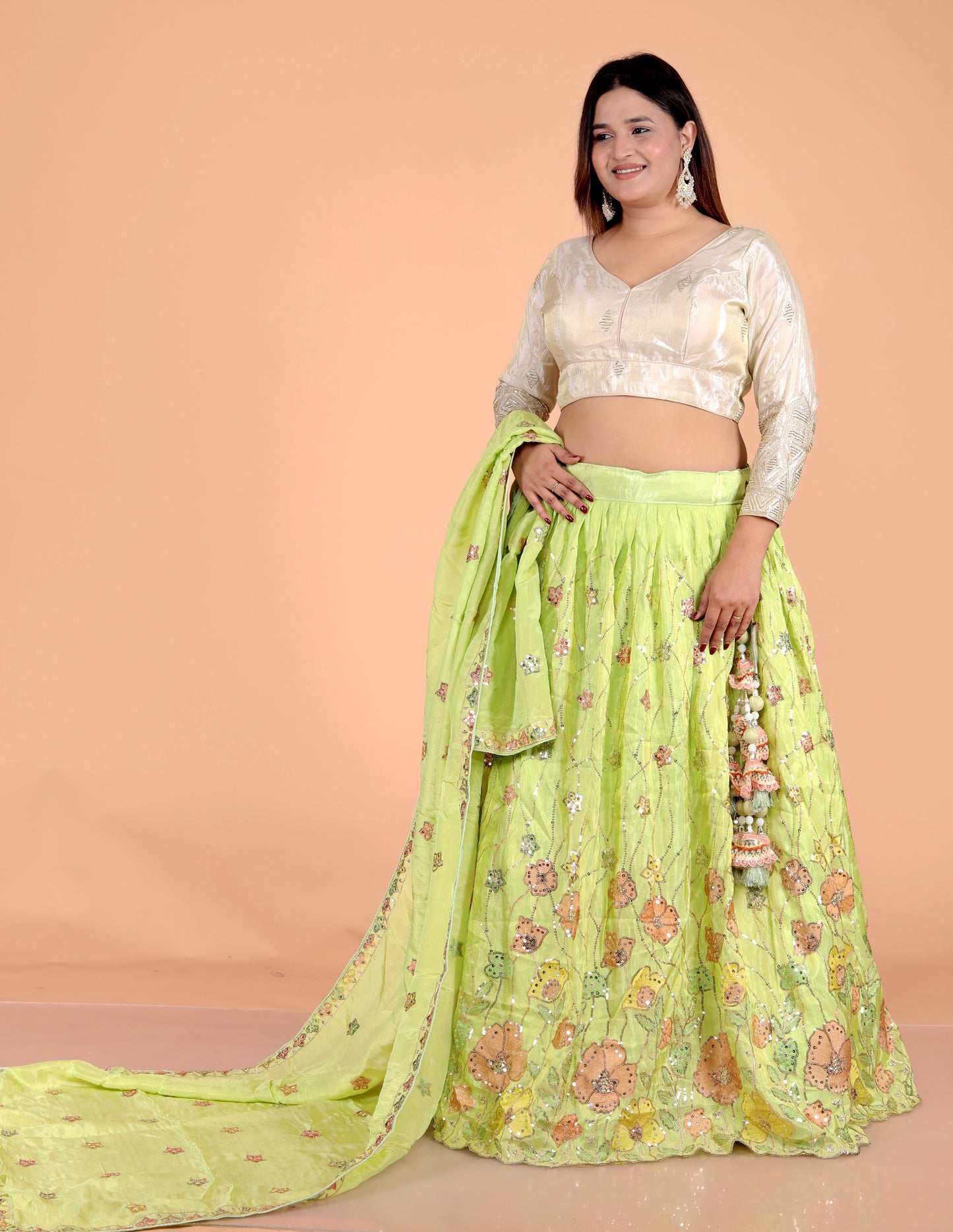 TISSUE APPLIQUE SEQUENCE WORK PARROT GREEN LEHNGA BY SKFBHOLUBHAI