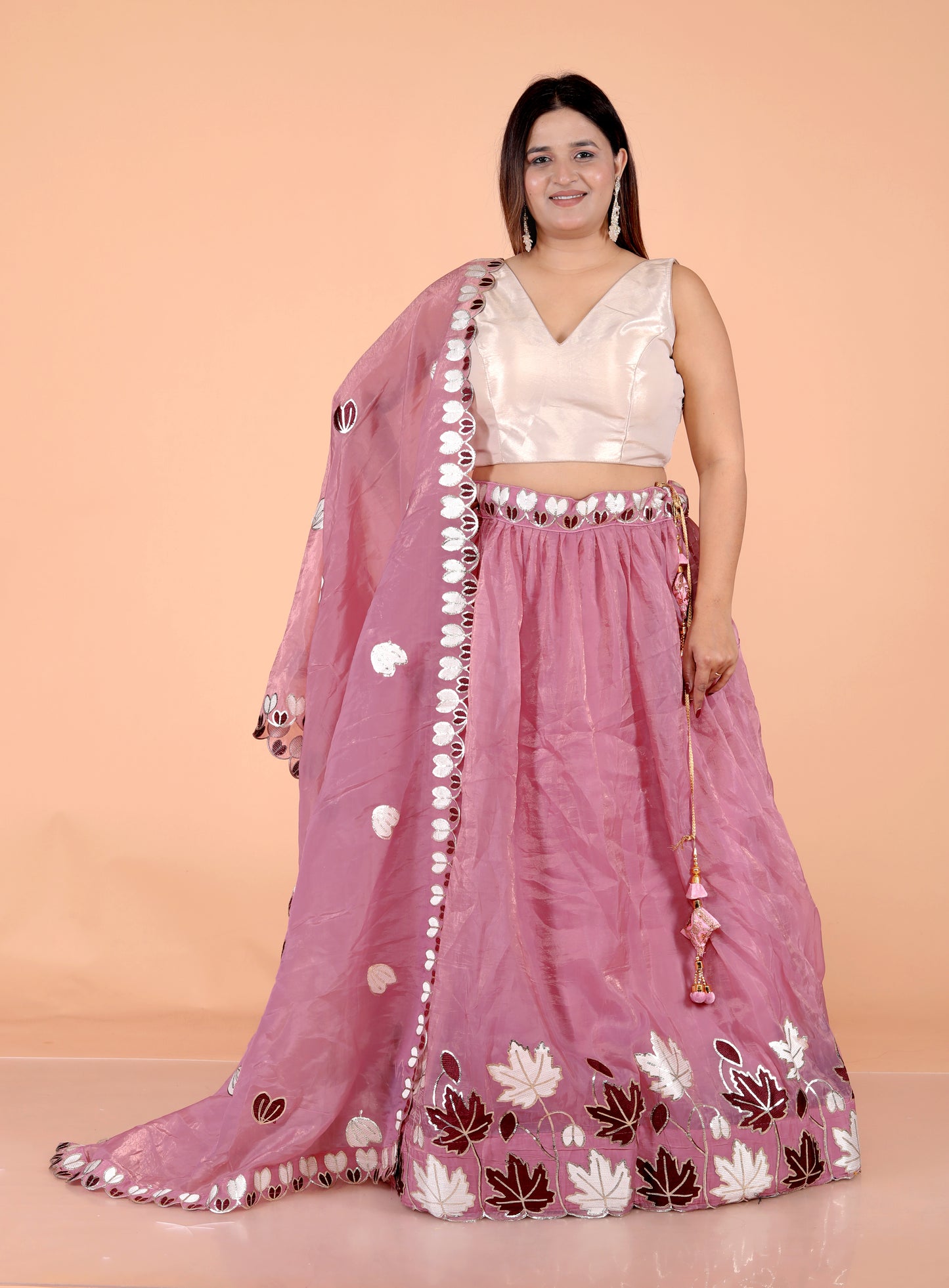 CRUSH TISSUE APPLIQUE WORK ONION PINK LEHNGA BY SKFBHOLUBHAI