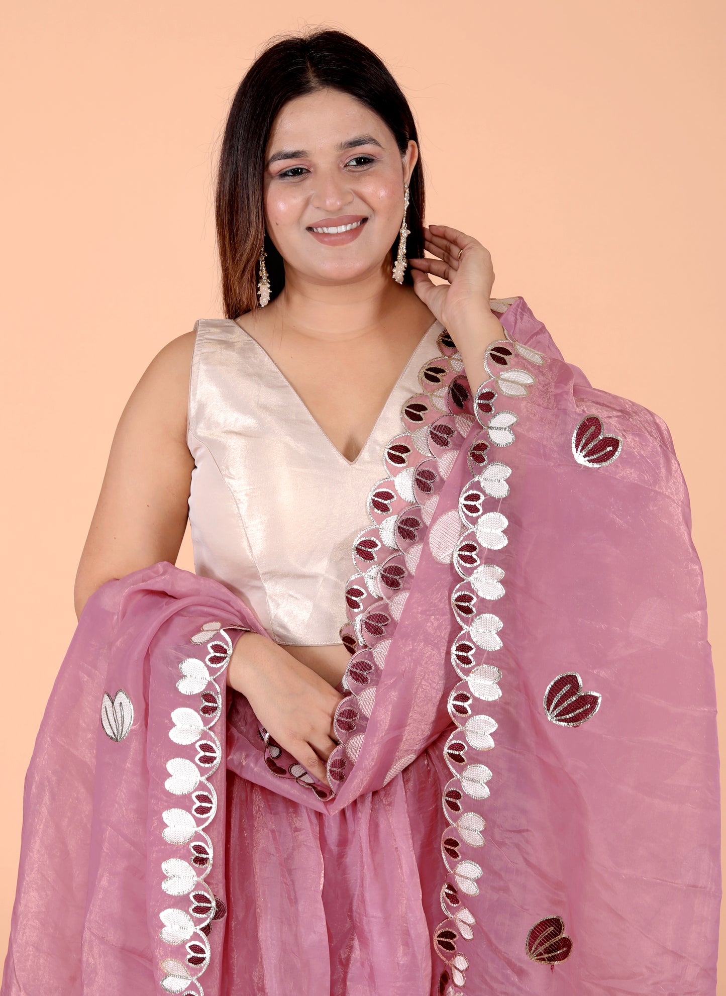 CRUSH TISSUE APPLIQUE WORK ONION PINK LEHNGA BY SKFBHOLUBHAI