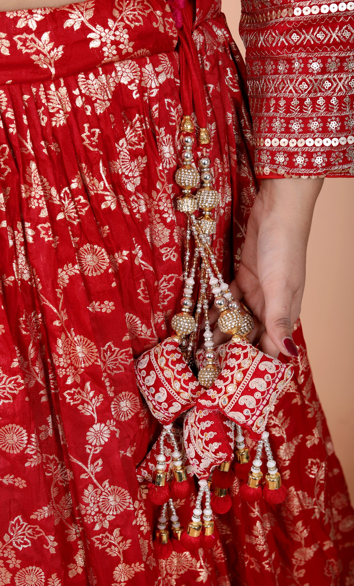 JACCQUARD SILK SEQUENCE BORDER WORK STICH RED LEHNGA BY SKFBHOLUBHAI