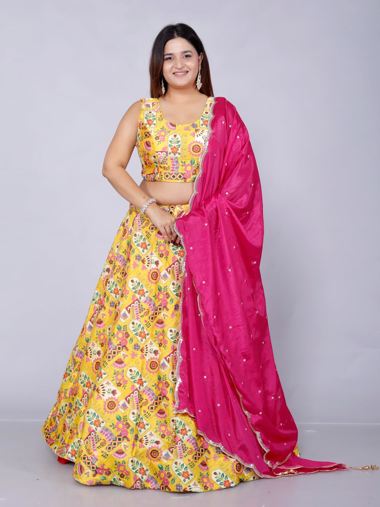 SILK HAND PAINTED ZARI OUTLINE WORK STICH YELLOW LEHNGA BY SKFBHOLUBHAI