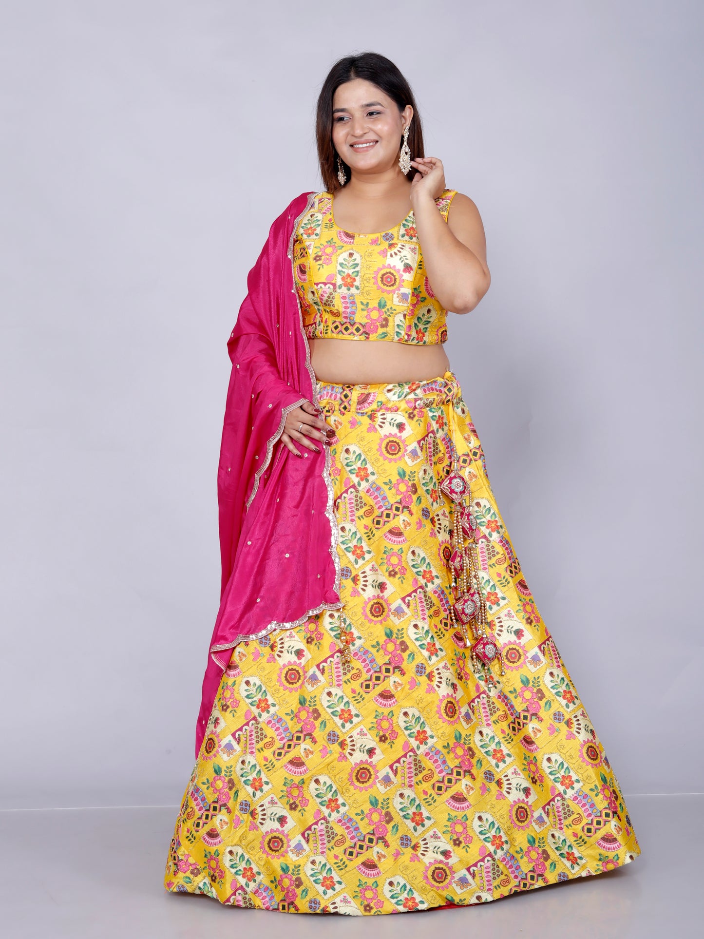 SILK HAND PAINTED ZARI OUTLINE WORK STICH YELLOW LEHNGA BY SKFBHOLUBHAI