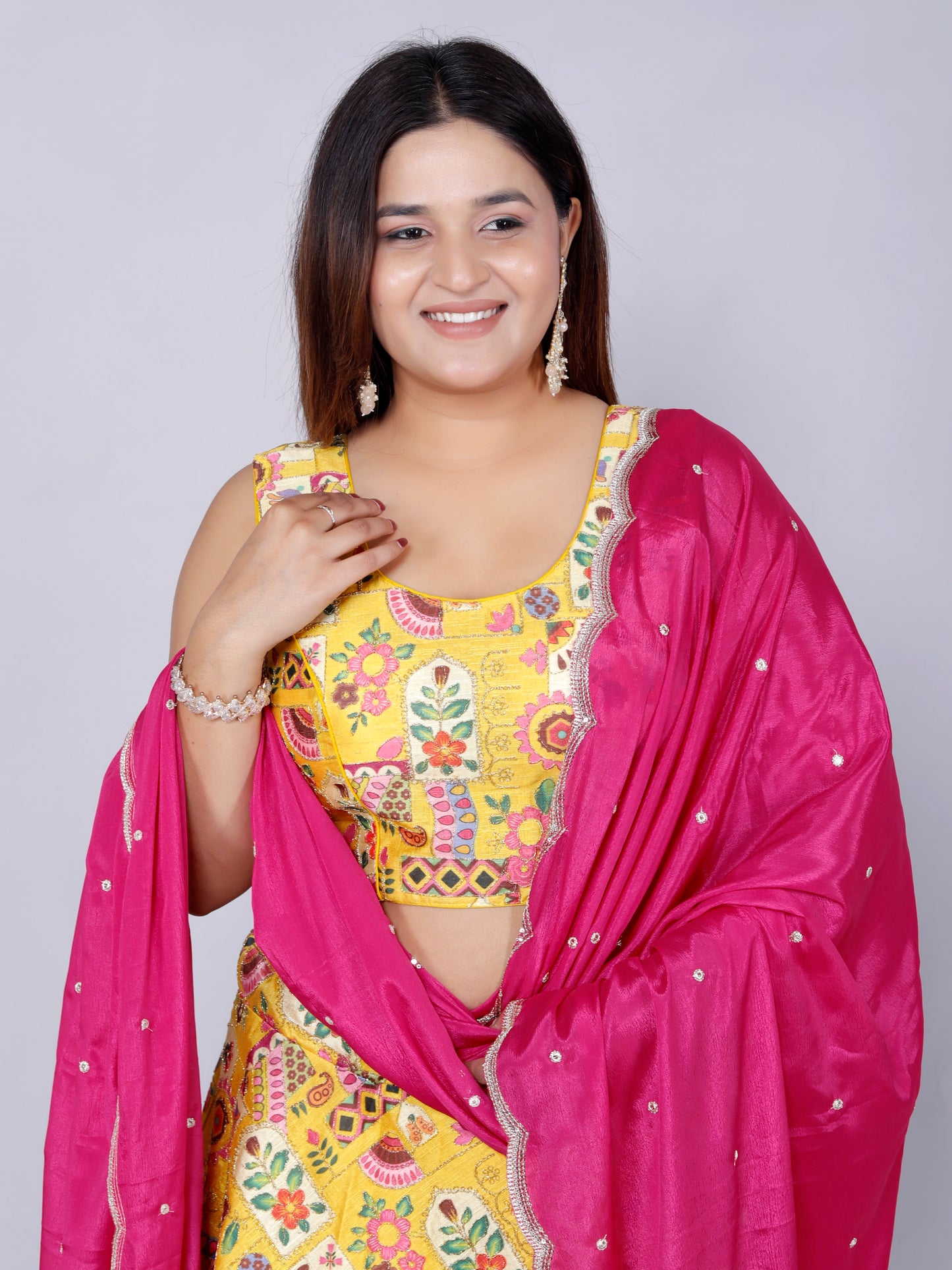 SILK HAND PAINTED ZARI OUTLINE WORK STICH YELLOW LEHNGA BY SKFBHOLUBHAI