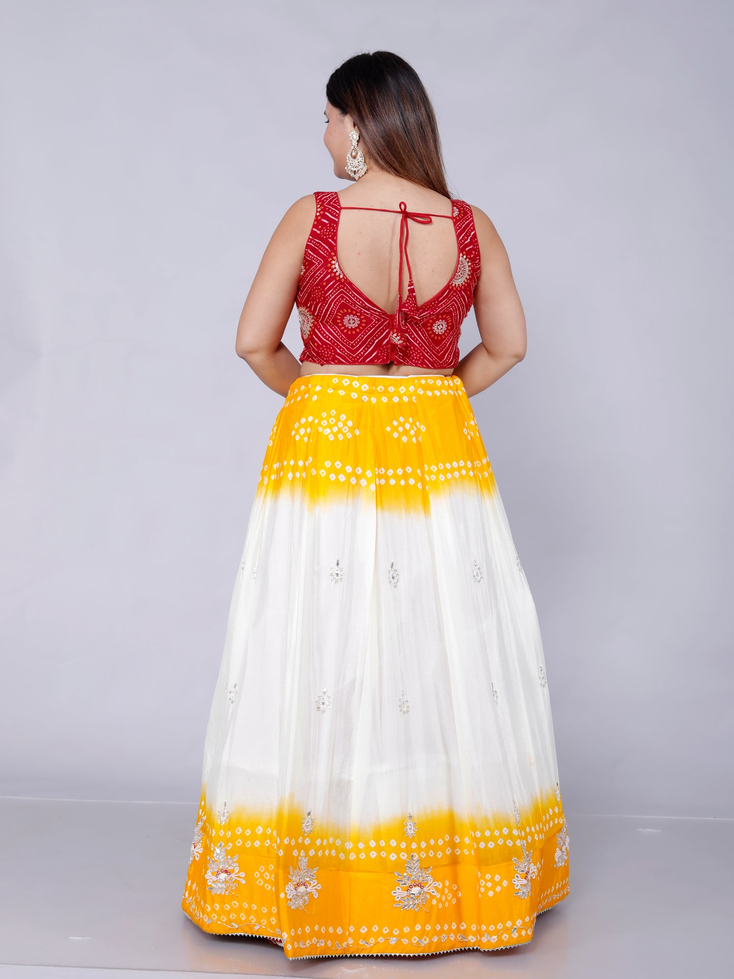 CHINON HANDWORK JAIPURI BHANDHANI VIBRANT YELLOW LEHNGA BY SKFBHOLUBHAI