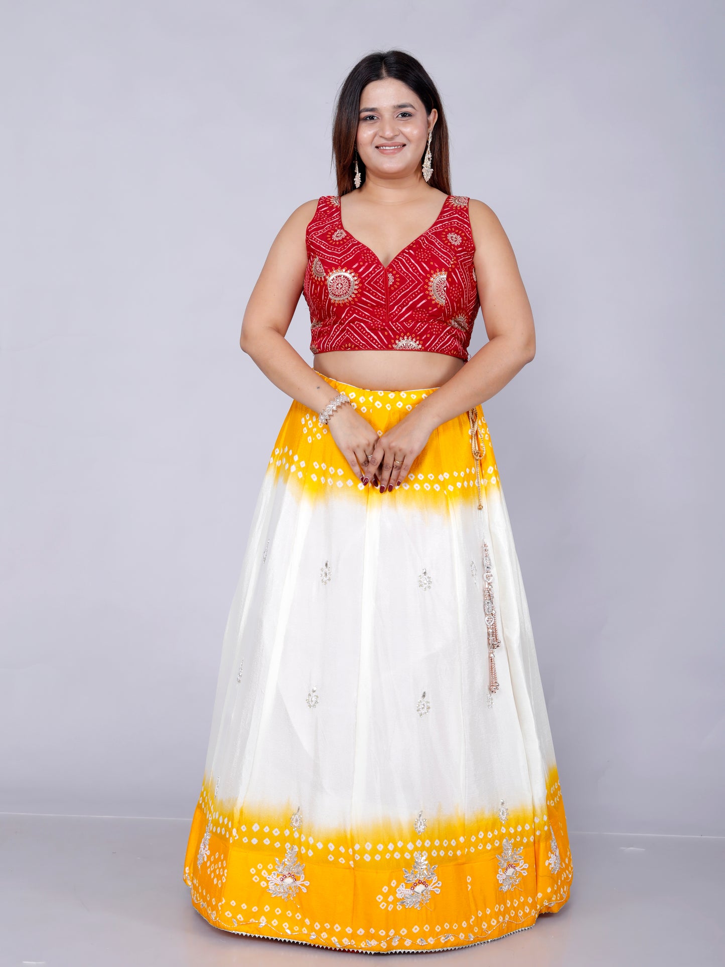CHINON HANDWORK JAIPURI BHANDHANI VIBRANT YELLOW LEHNGA BY SKFBHOLUBHAI