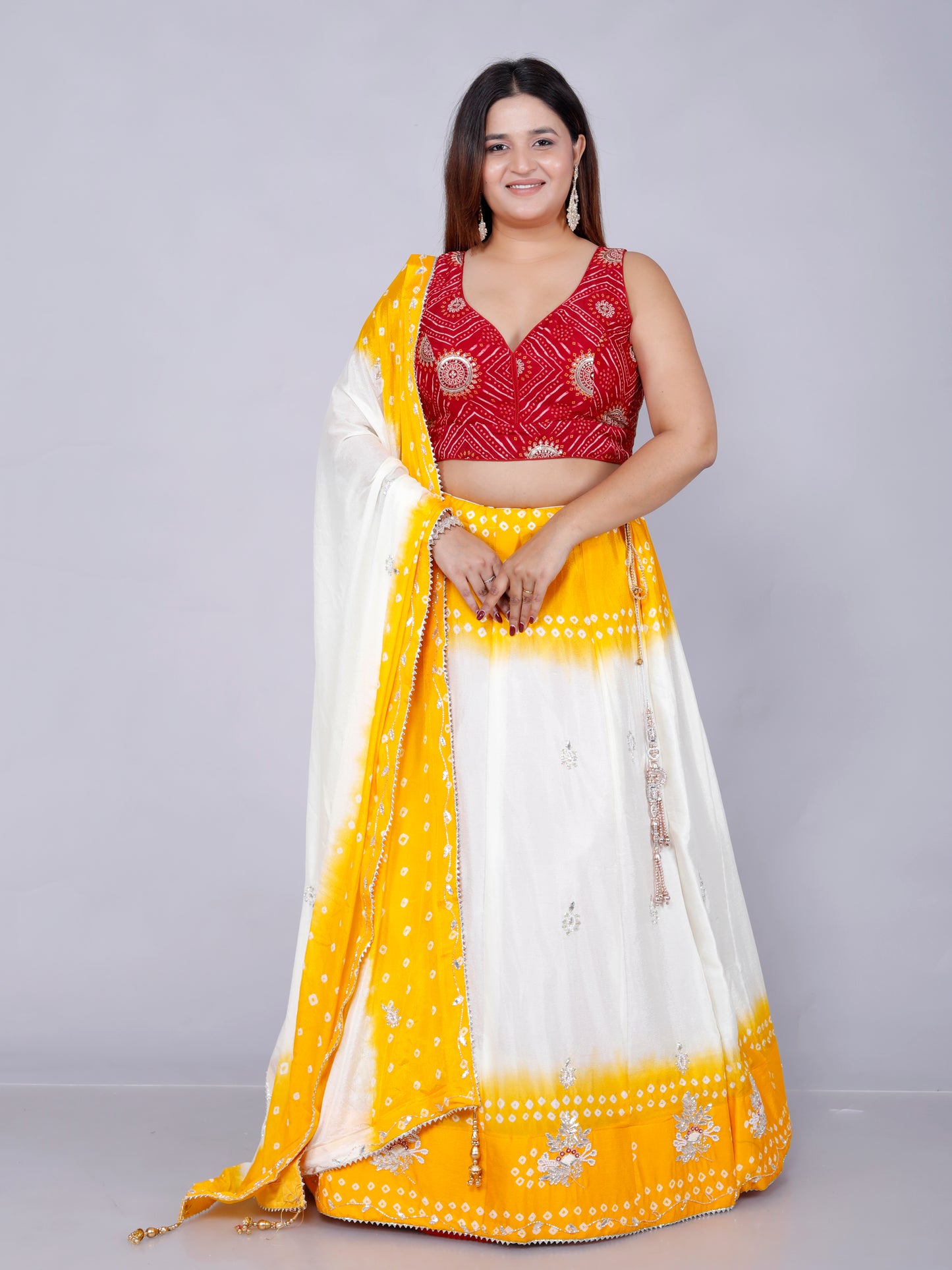 CHINON HANDWORK JAIPURI BHANDHANI VIBRANT YELLOW LEHNGA BY SKFBHOLUBHAI