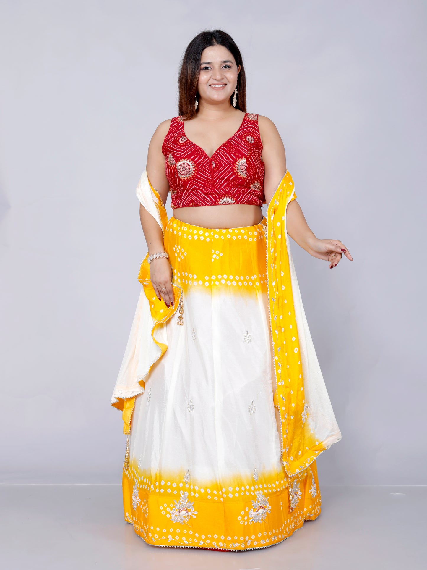 CHINON HANDWORK JAIPURI BHANDHANI VIBRANT YELLOW LEHNGA BY SKFBHOLUBHAI