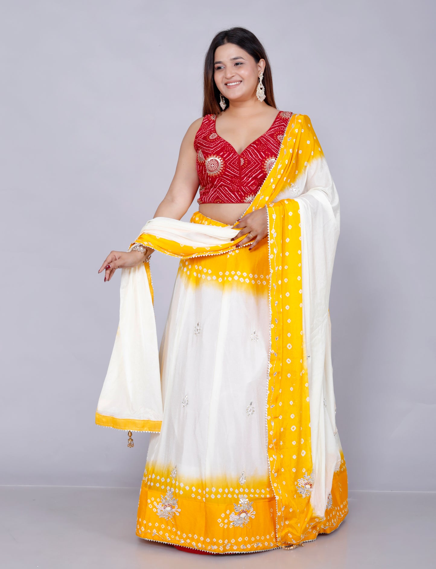 CHINON HANDWORK JAIPURI BHANDHANI VIBRANT YELLOW LEHNGA BY SKFBHOLUBHAI