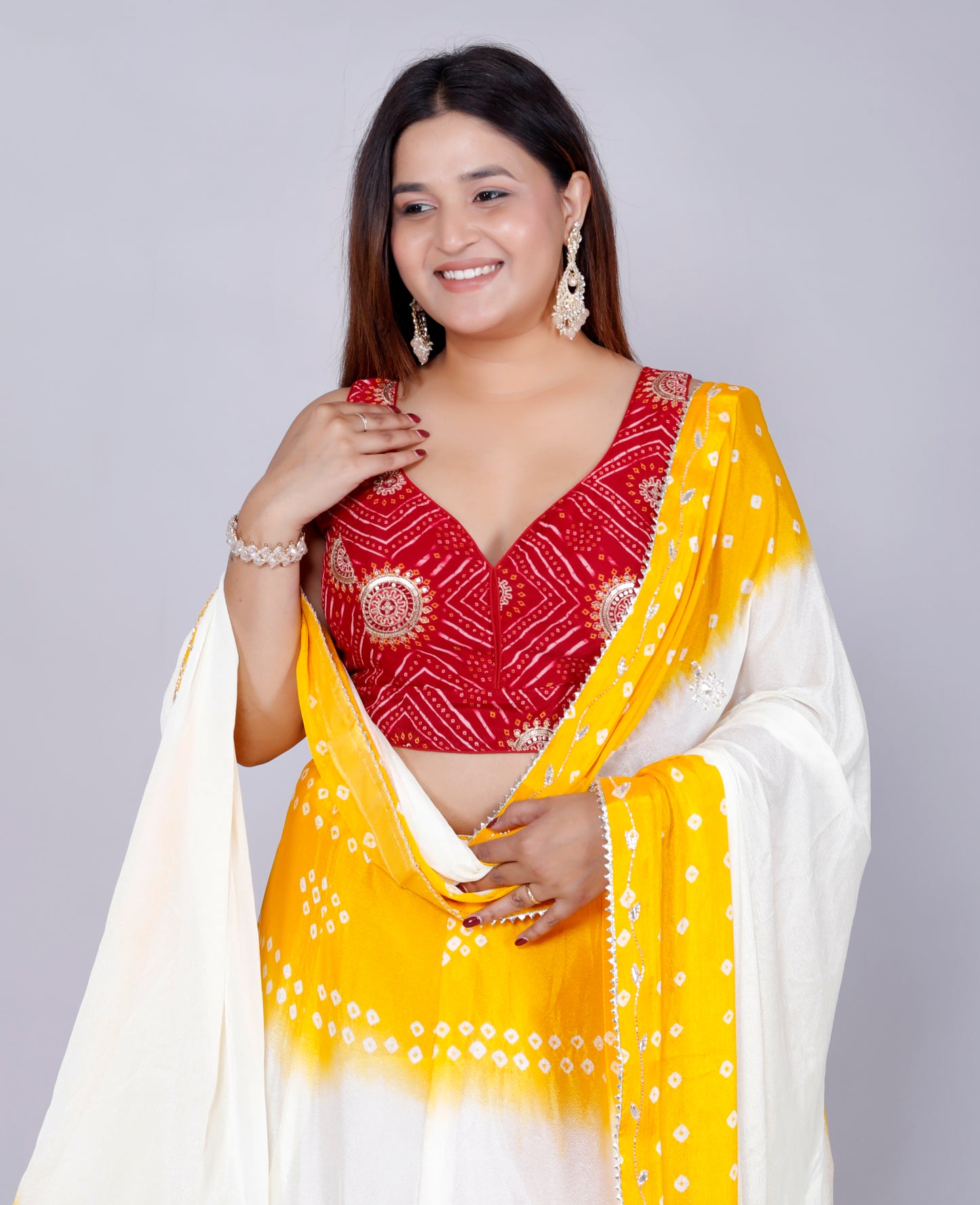 CHINON HANDWORK JAIPURI BHANDHANI VIBRANT YELLOW LEHNGA BY SKFBHOLUBHAI