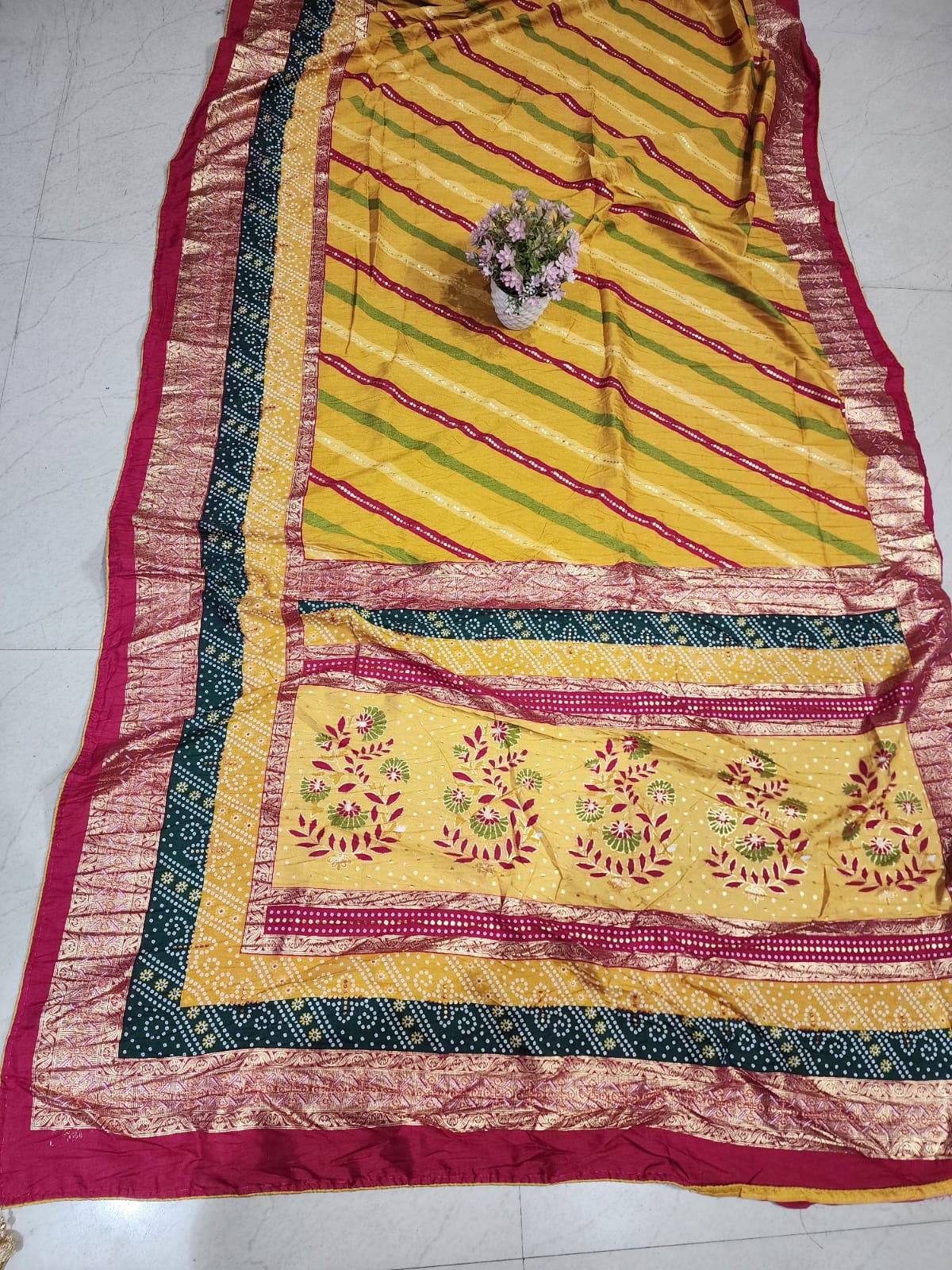 SAWAN LEHARIYA YELLOW COLOUR WITH FOIL AND DOLA CRUSH FABRIC BY SKFBHOLUBHAI
