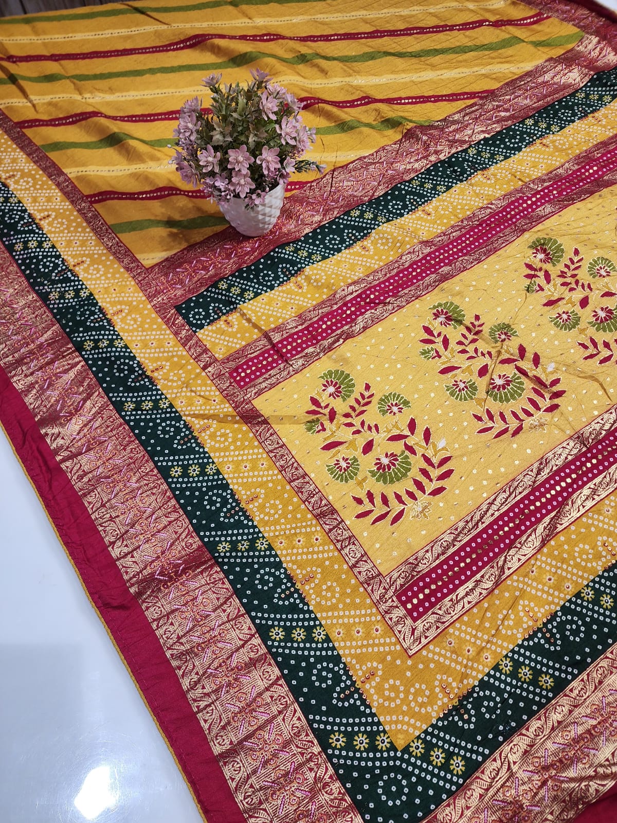 SAWAN LEHARIYA YELLOW COLOUR WITH FOIL AND DOLA CRUSH FABRIC BY SKFBHOLUBHAI