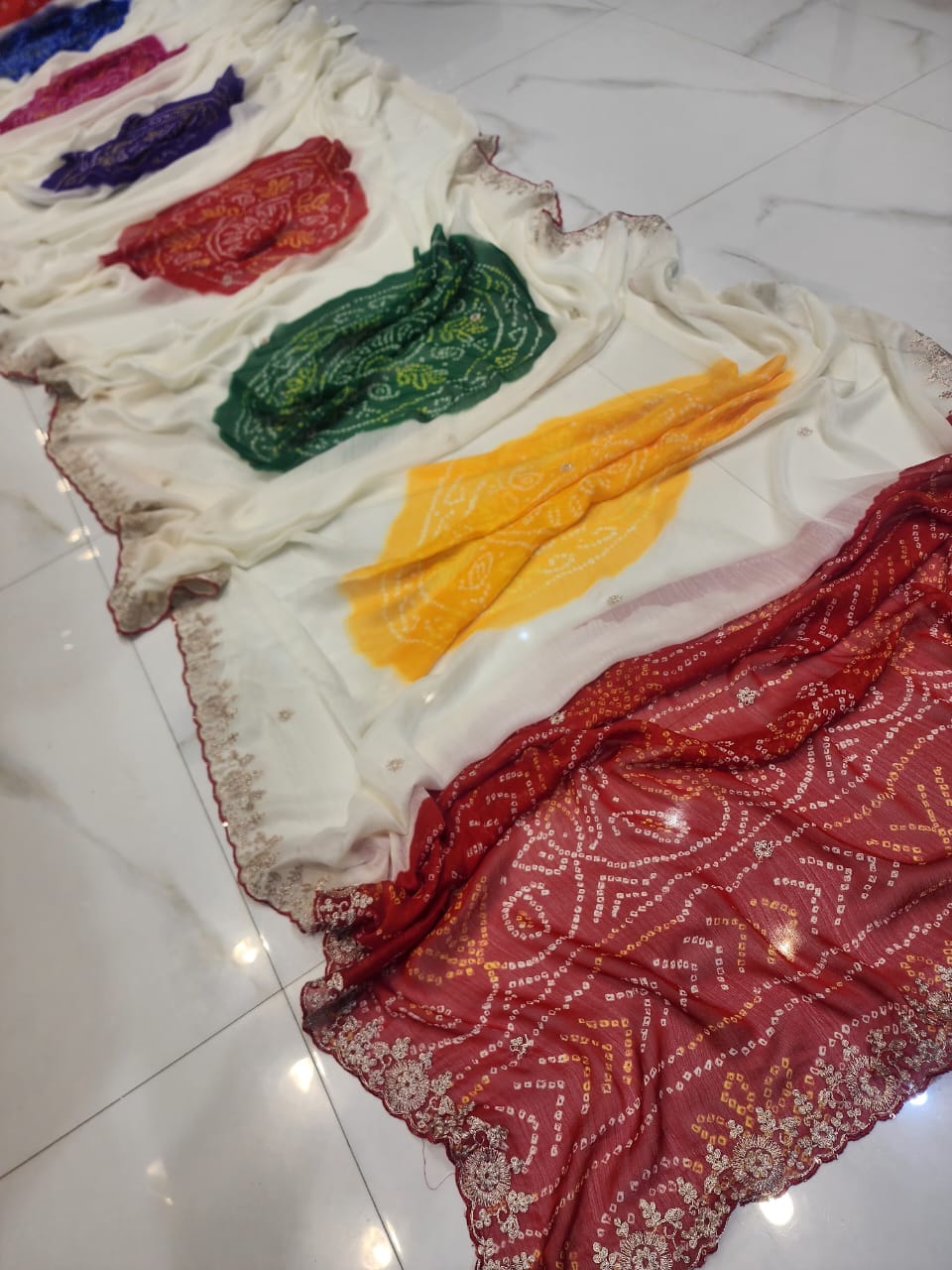 RAJASTHANI SPECIAL GHEVAR BANDHEJ MARBLE CHIFFON AND JARI WORK SAREE BY SKFBHOLUBHAI