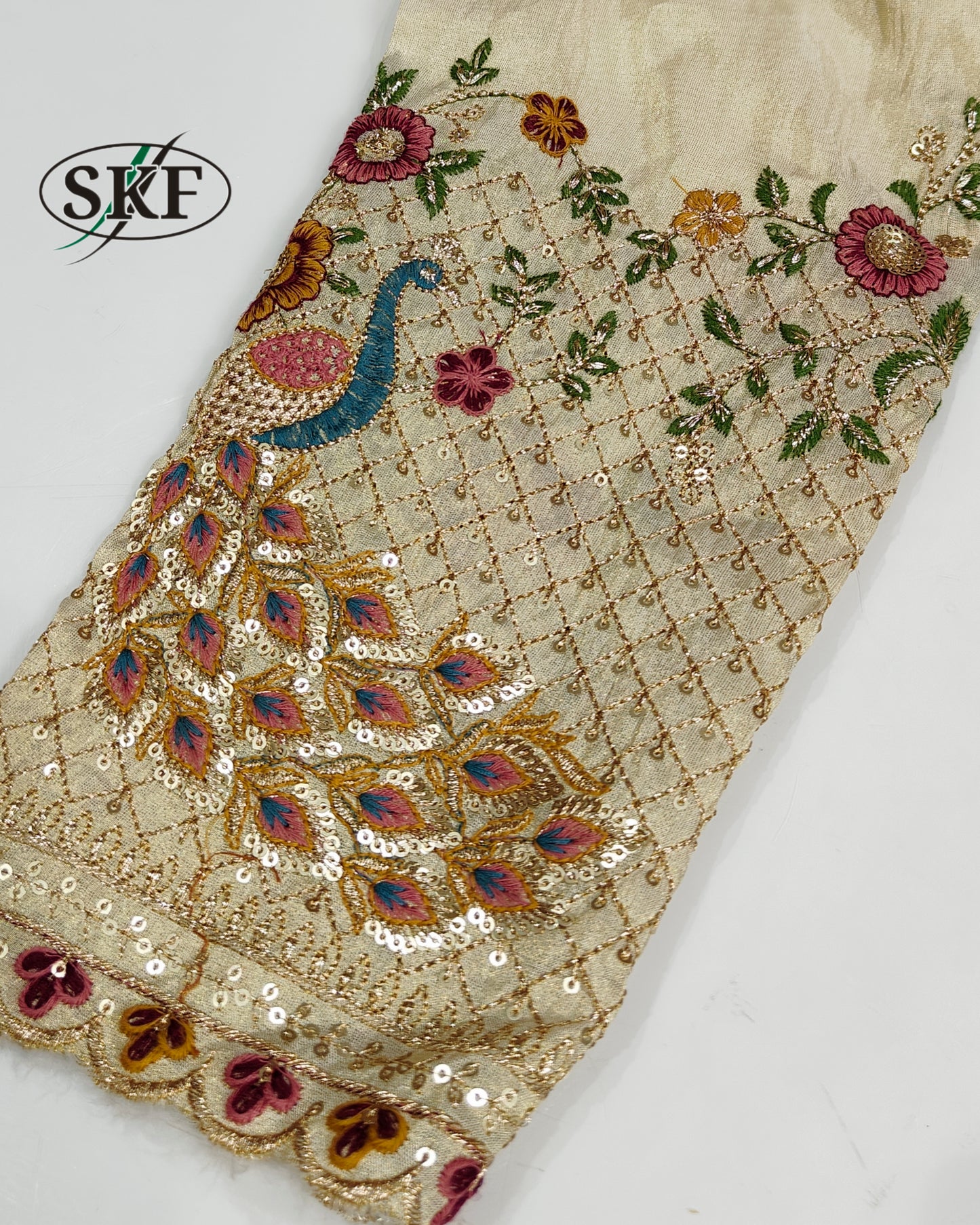 TISSUE EMBROIDERY SEQUENCE GOLDEN IVORY BLOUSE BY SKFBHOLUBHAI
