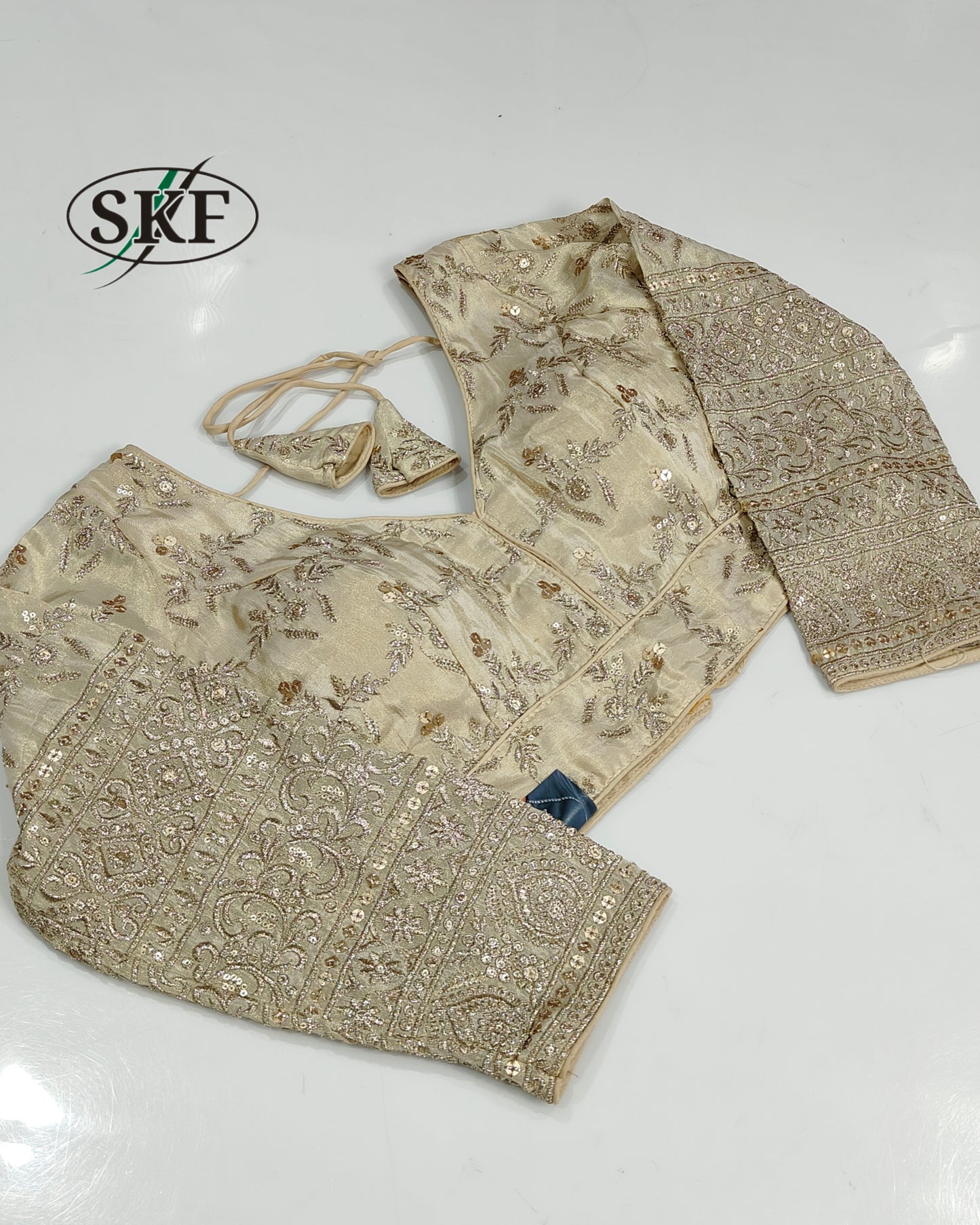 TISSUE SEQUENCE EMBROIDERY GOLDEN BEIGE BLOUSE BY SKFBHOLUBHAI
