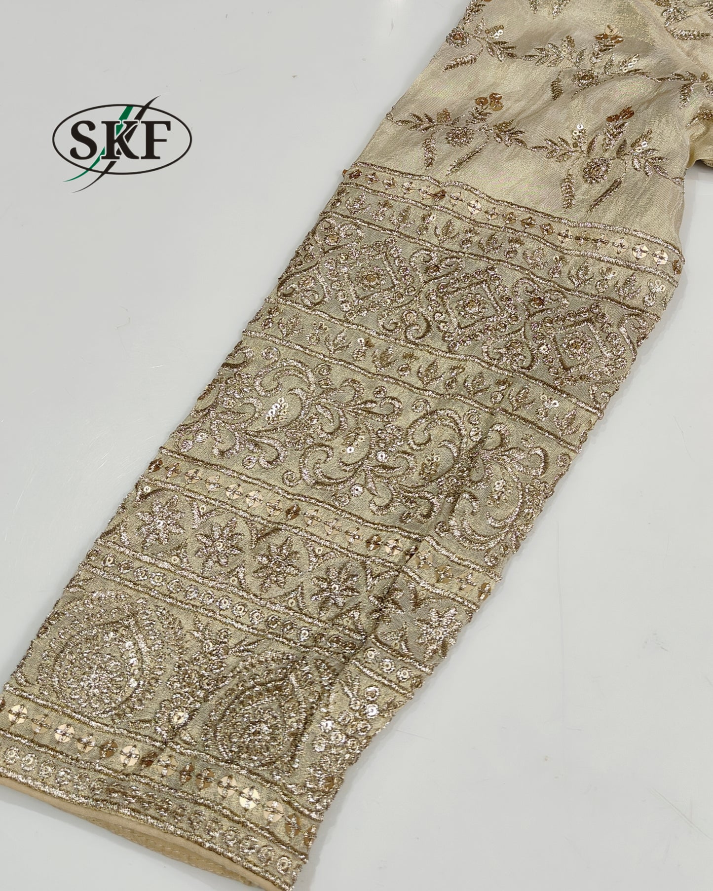 TISSUE SEQUENCE EMBROIDERY GOLDEN BEIGE BLOUSE BY SKFBHOLUBHAI