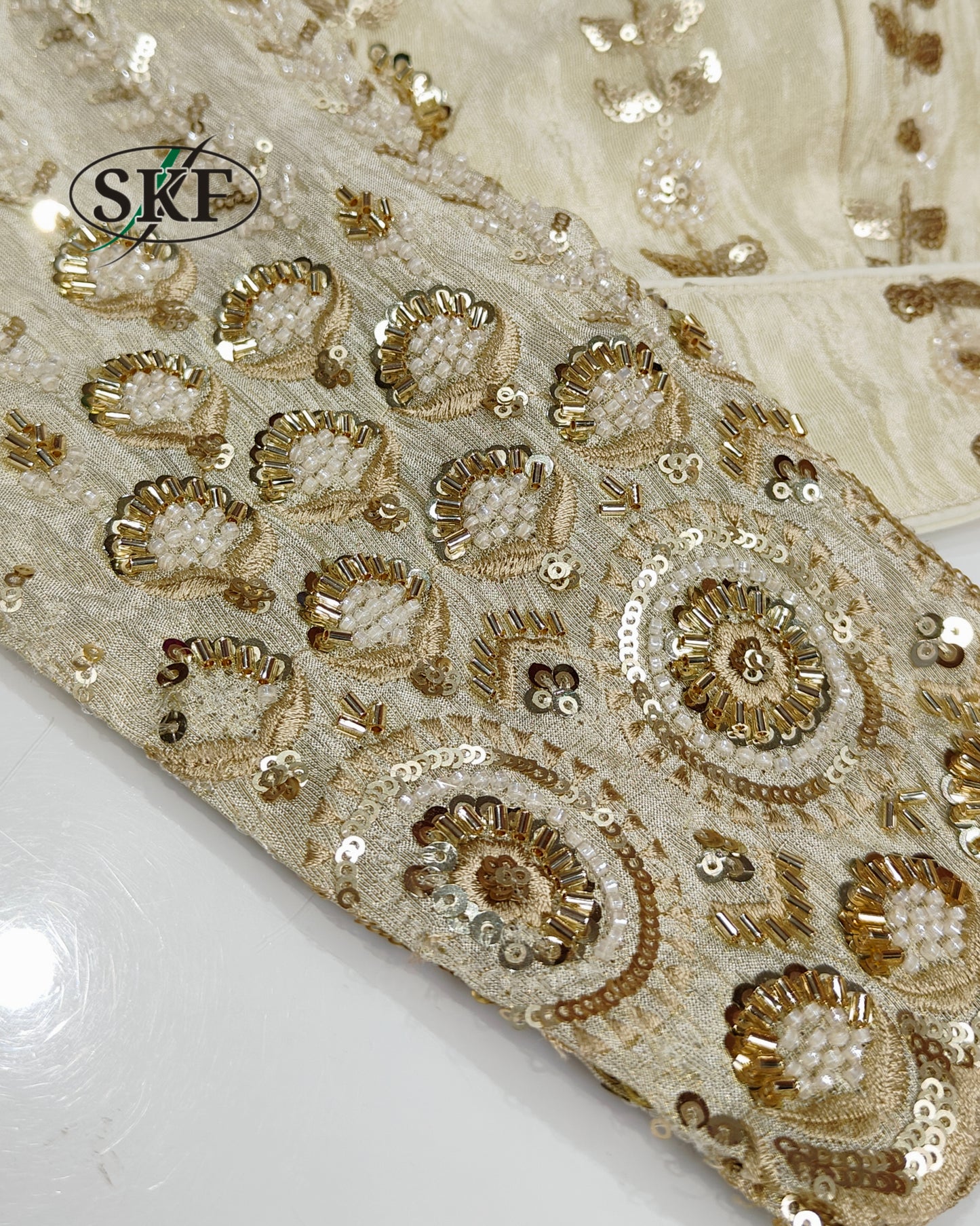 TISSUE HANDWORK SEQUENCE GOLDEN IVORY BLOUSE BY SKFBHOLUBHAI