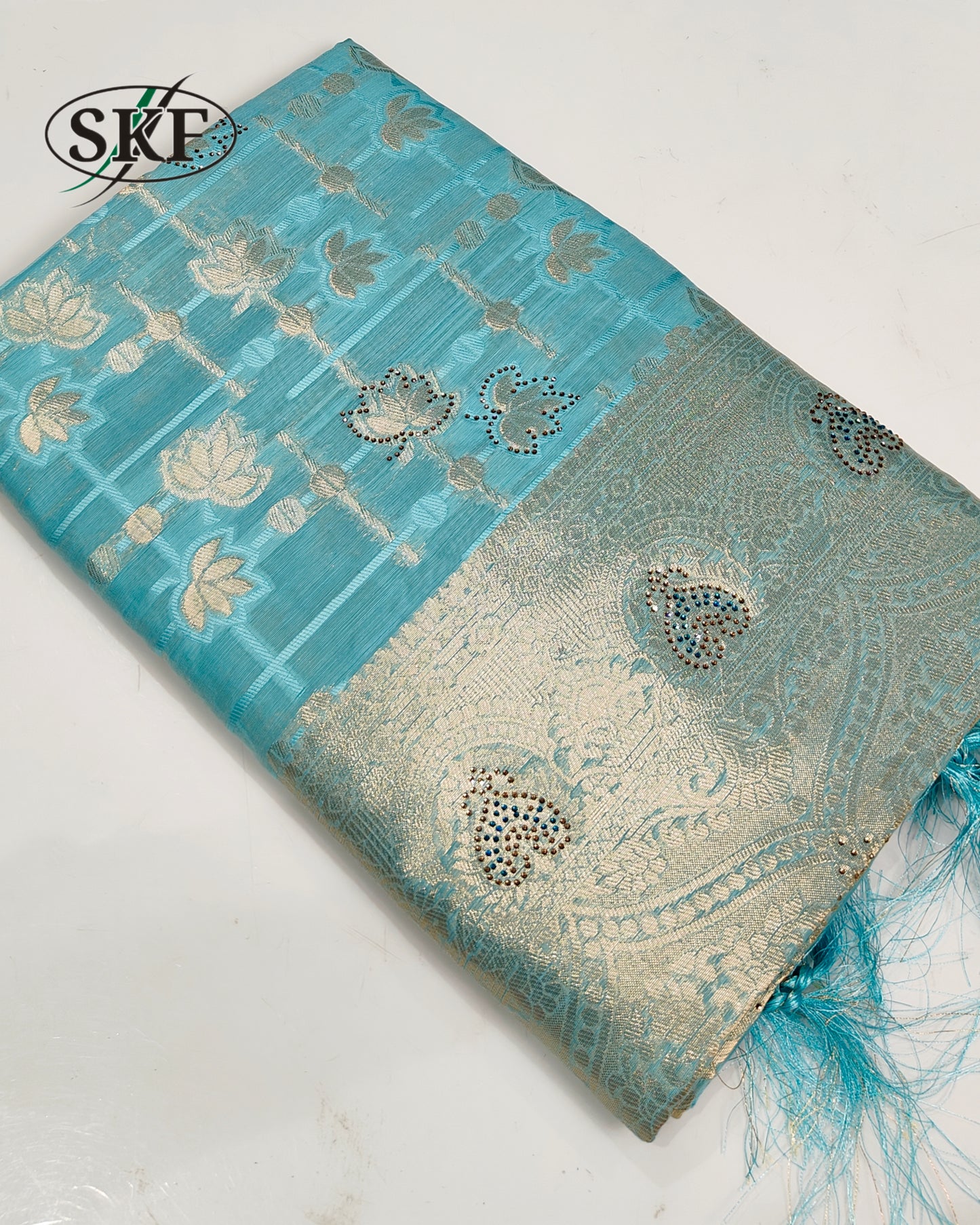 SILK WEAVING SEROSKI WORK SEE GREEN SAREE BY SKFBHOLUBHAI