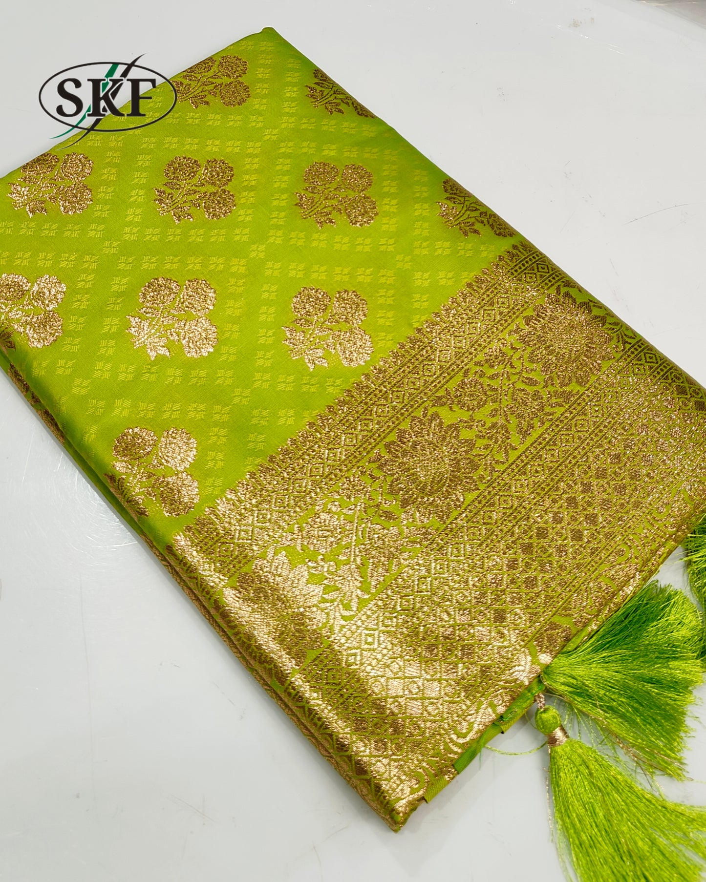 BANARSI SILK GOLD ZARI WEAVING BOTTLE GREEN SAREE BY SKFBHOLUBHAI