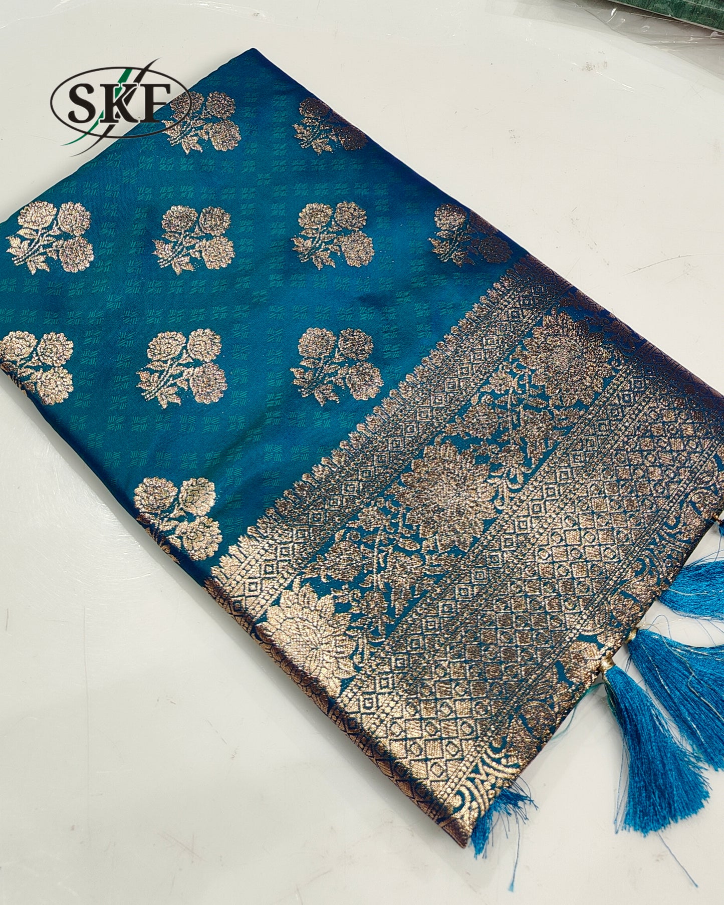 BANARSI SILK GOLD ZARI WEAVING BOTTLE GREEN SAREE BY SKFBHOLUBHAI