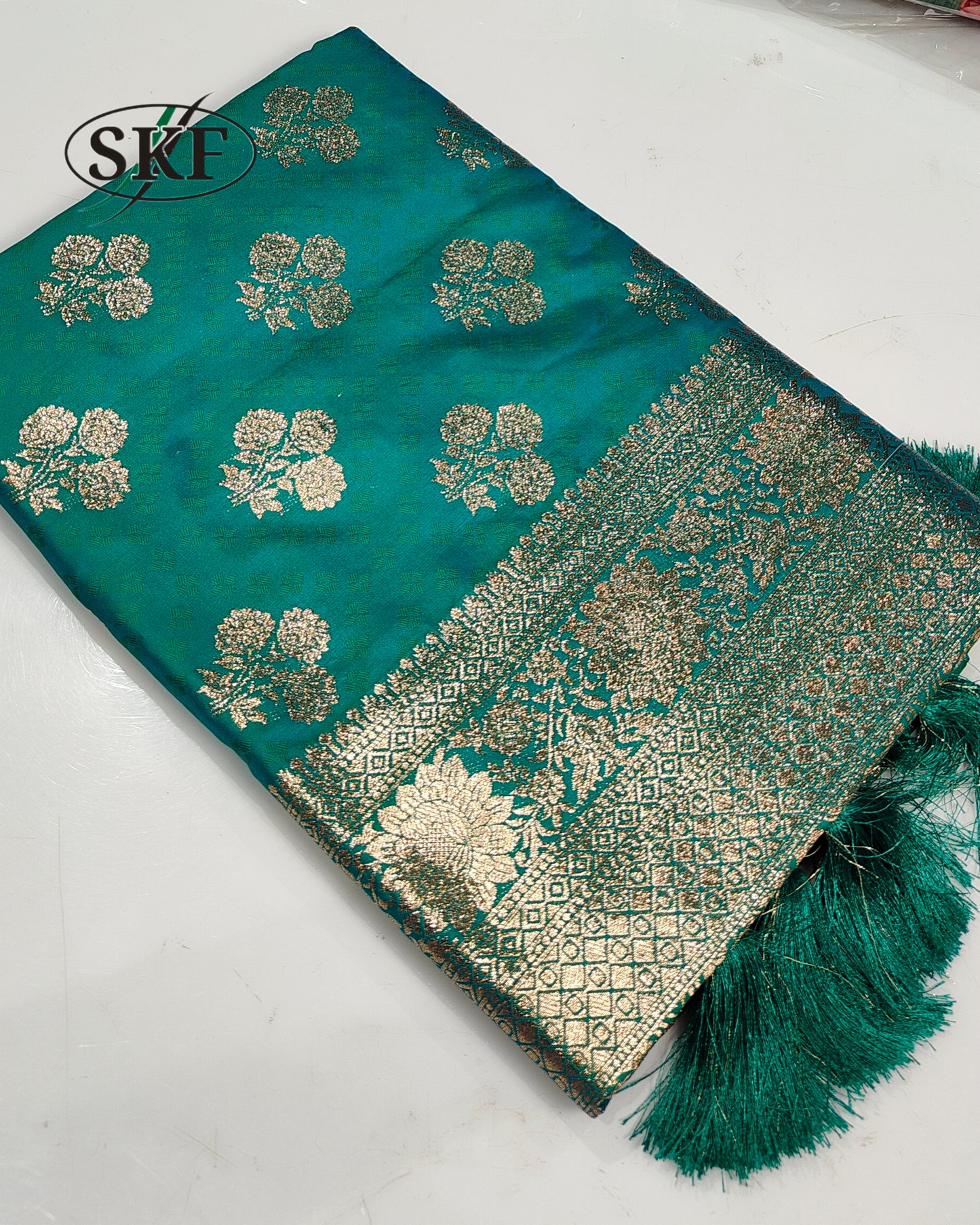 BANARSI SILK GOLD ZARI WEAVING BOTTLE GREEN SAREE BY SKFBHOLUBHAI