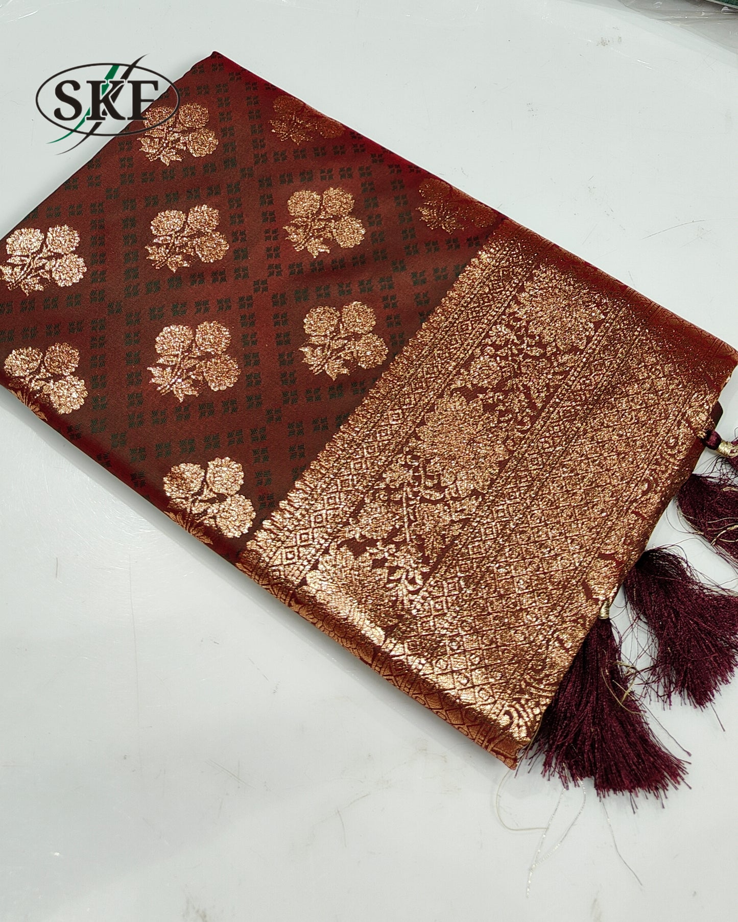 BANARSI SILK GOLD ZARI WEAVING BOTTLE GREEN SAREE BY SKFBHOLUBHAI
