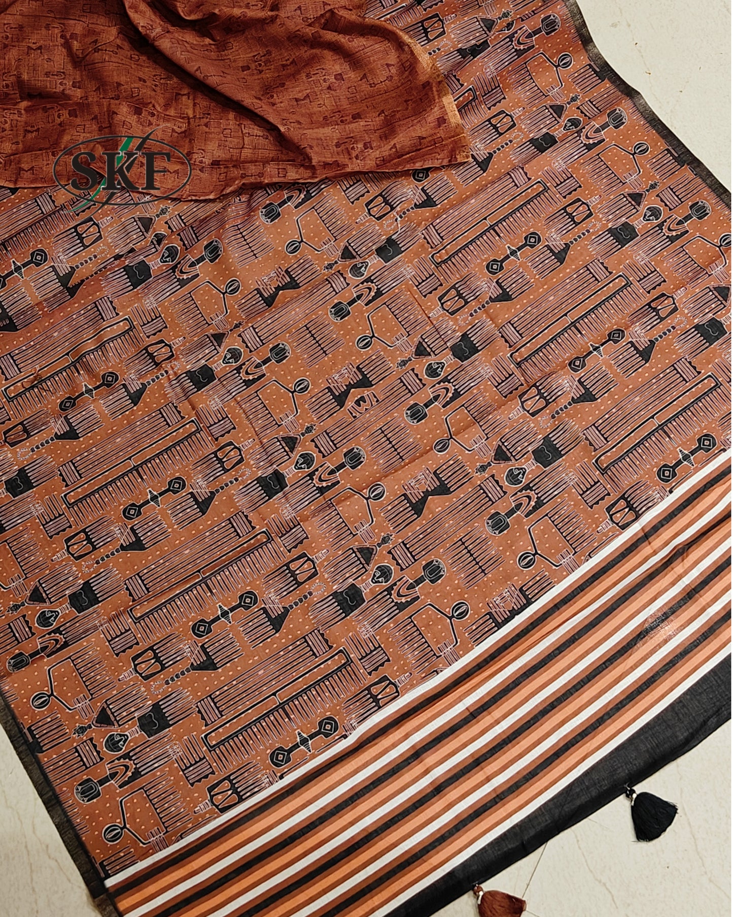 LINEN COTTON DIGITAL EYGPTIAN PRINT WEAVING BORDER WORK BROWN SAREE BY SKFBHOLUBHAI