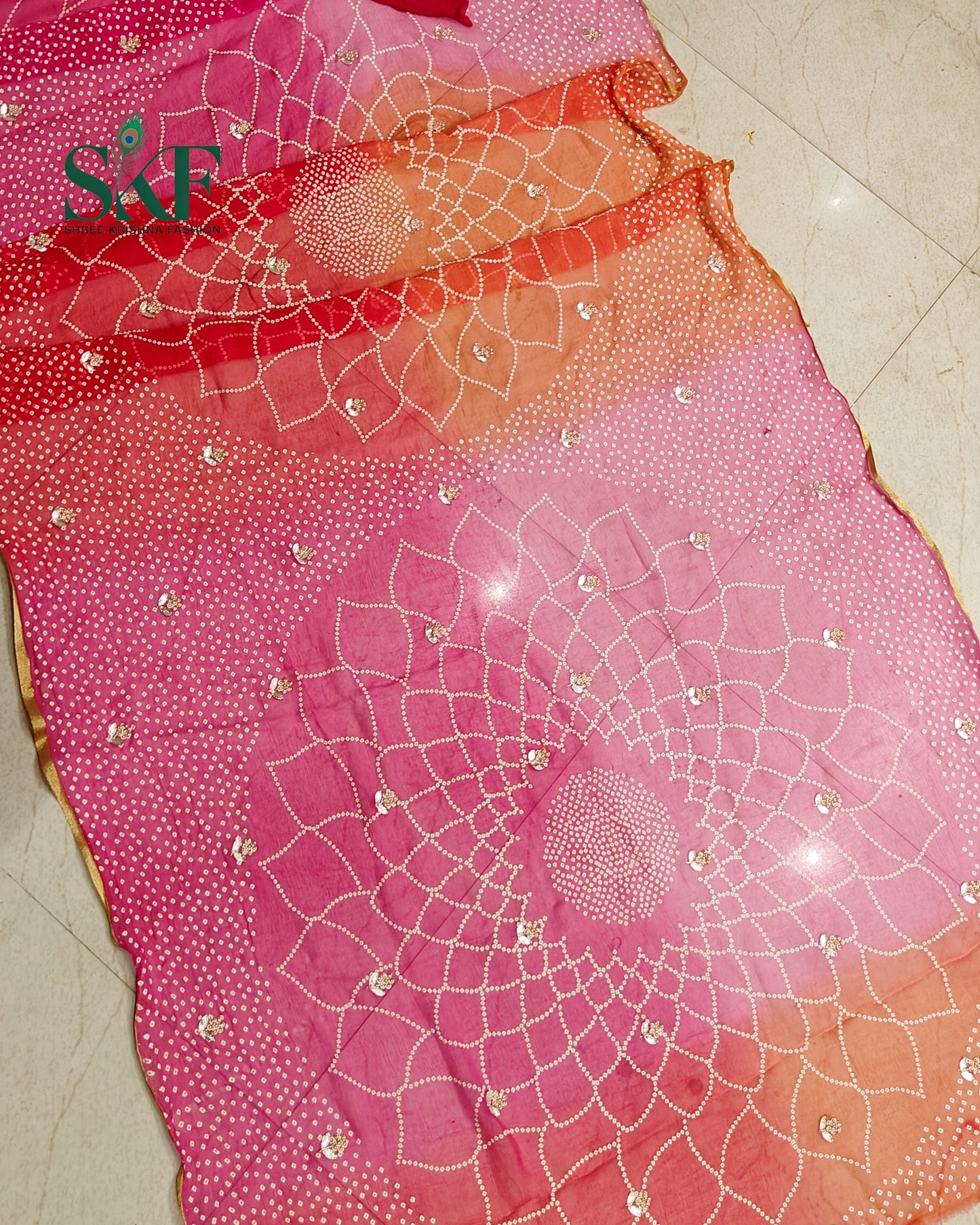 CHIFFON BHANDHANI HANDWORK BUTTY PINK OMBRE DYE SAREE BY SKFBHOLUBHAI