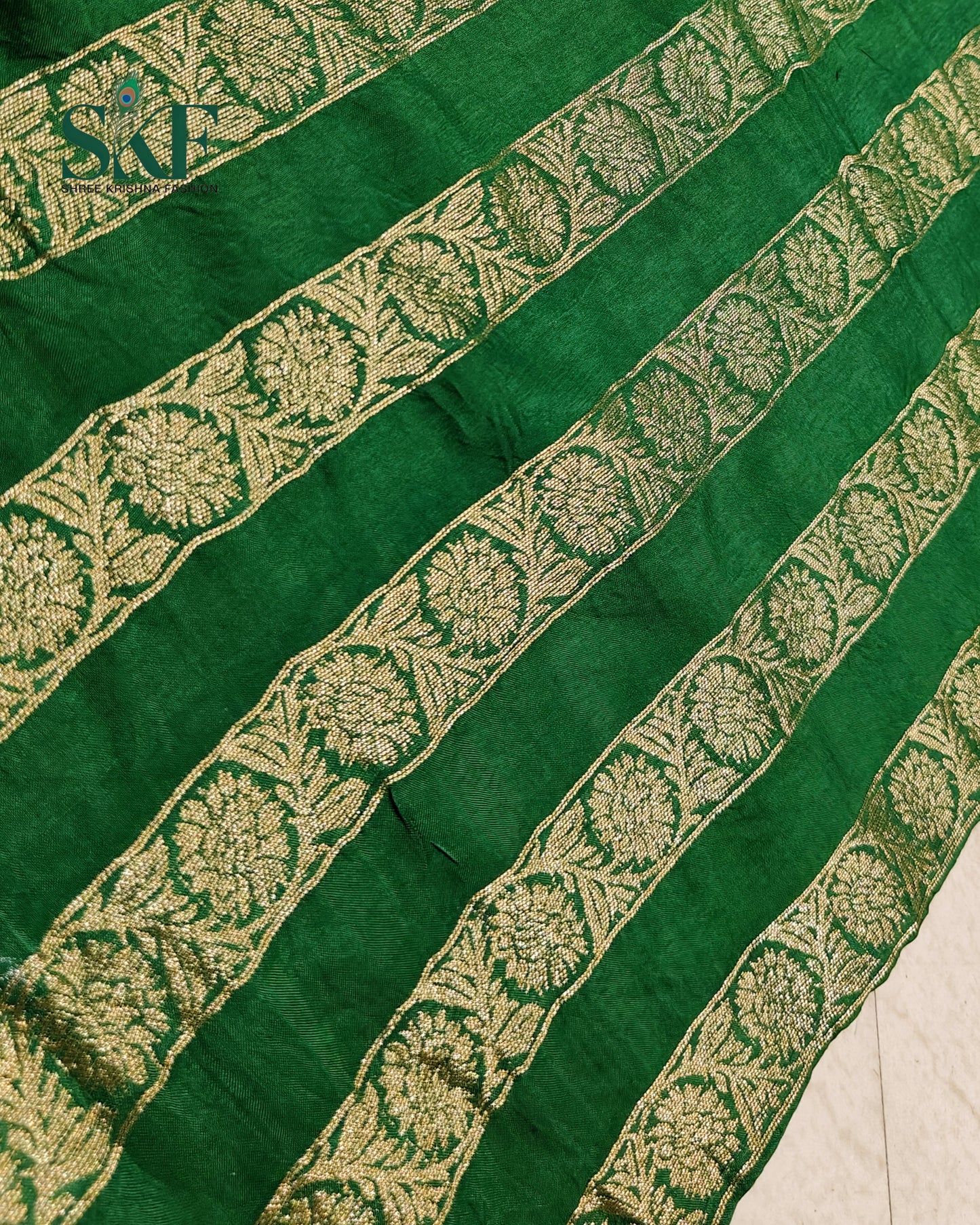 HO SILK PARROT BORDER ZARI BUTTY WEAVING WORK BOTTLE GREEN SAREE BY SKFBHOLUBHAI