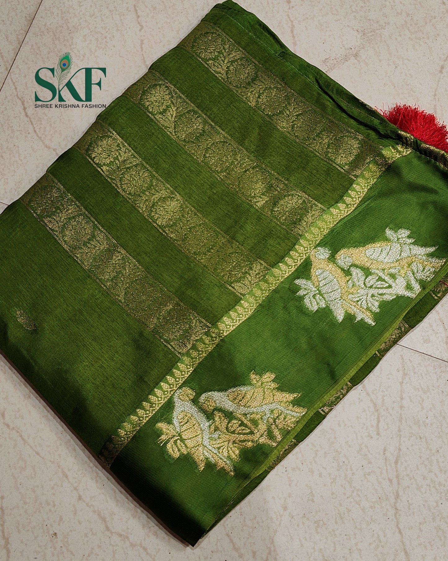 HO SILK PARROT BORDER ZARI BUTTY WEAVING WORK MEHNDI GREEN SAREE BY SKFBHOLUBHAI