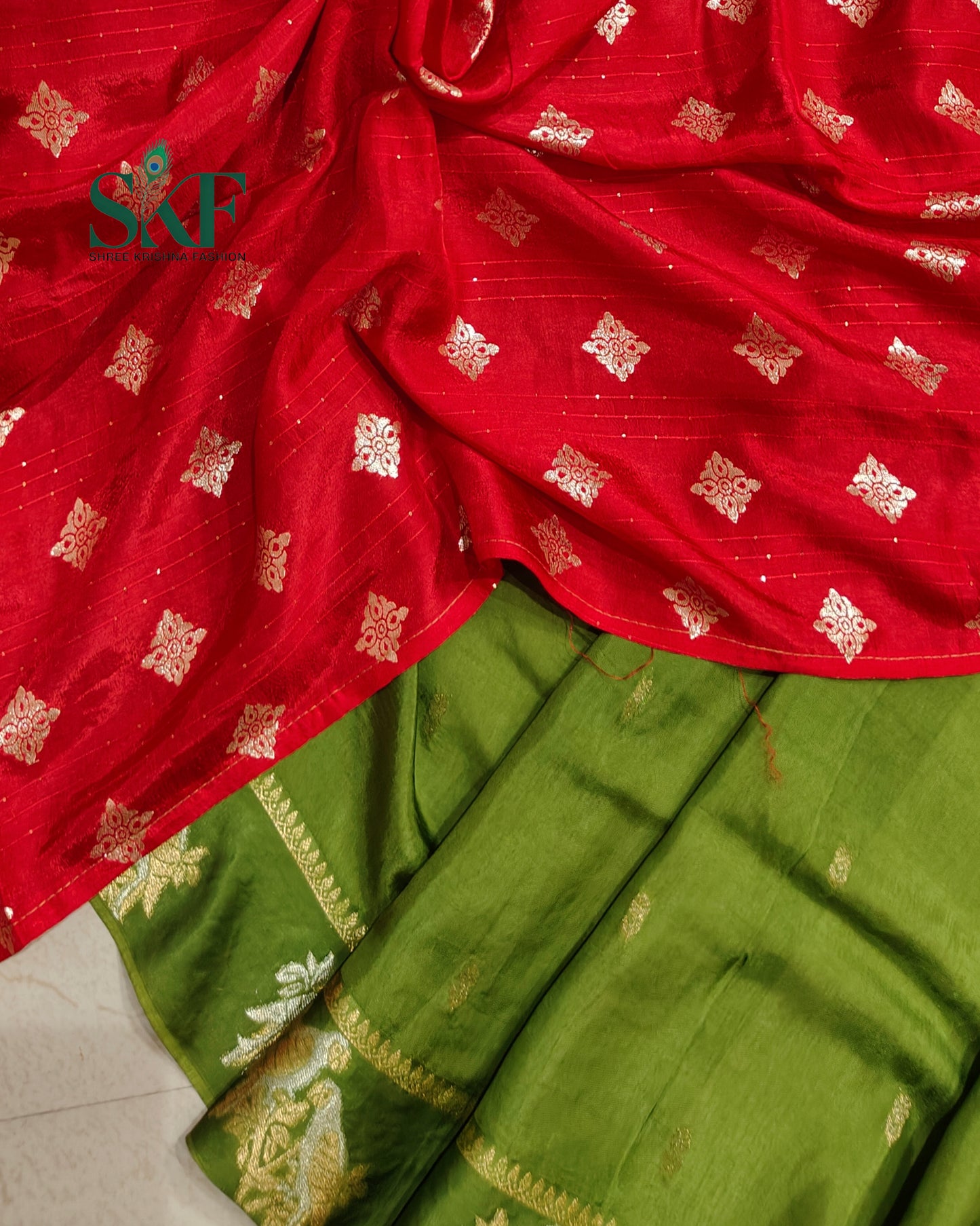 HO SILK PARROT BORDER ZARI BUTTY WEAVING WORK MEHNDI GREEN SAREE BY SKFBHOLUBHAI