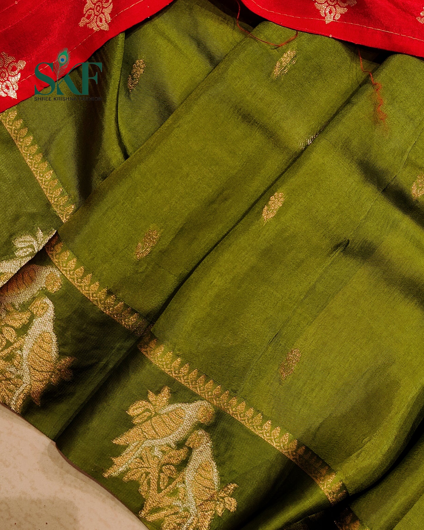 HO SILK PARROT BORDER ZARI BUTTY WEAVING WORK MEHNDI GREEN SAREE BY SKFBHOLUBHAI