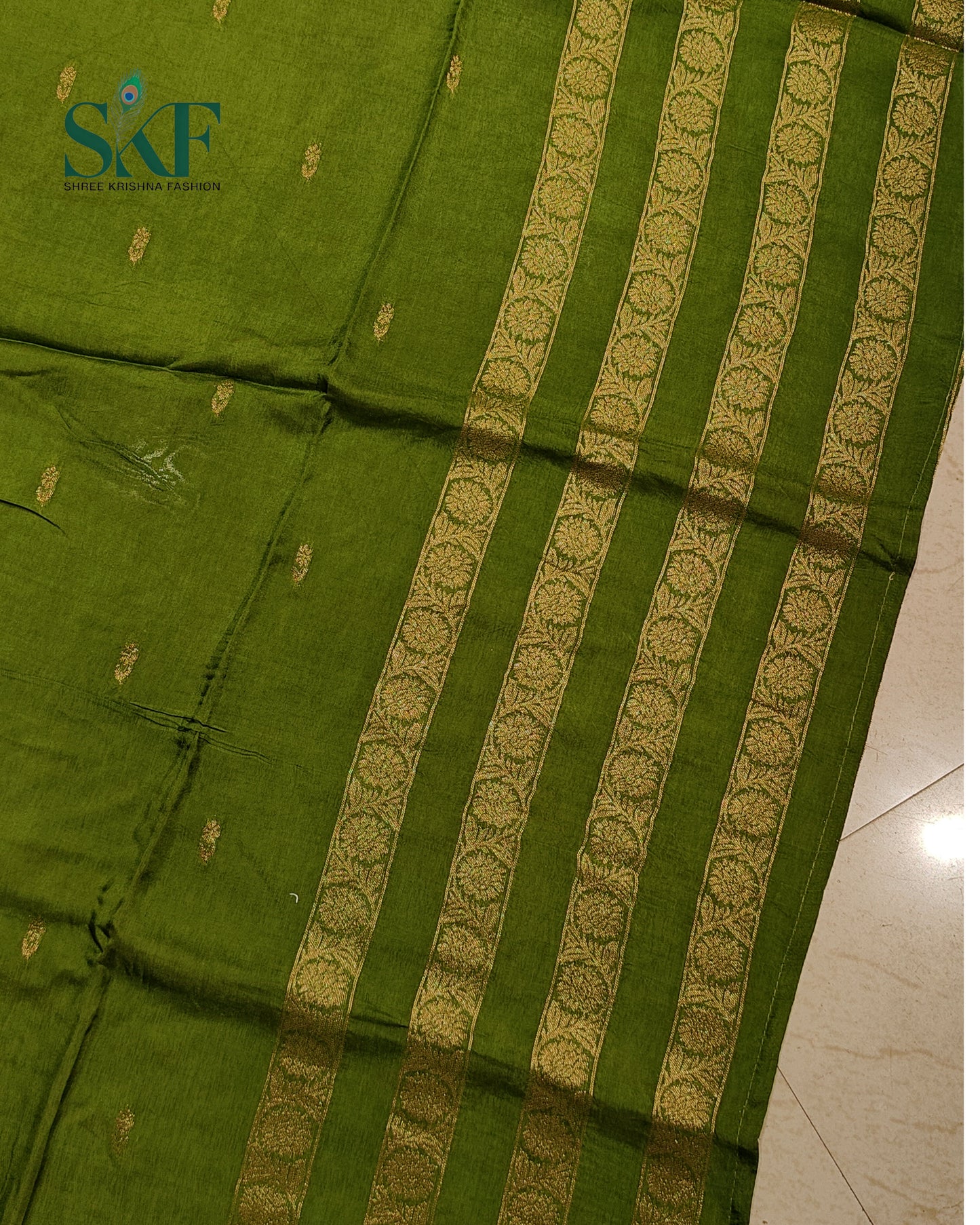 HO SILK PARROT BORDER ZARI BUTTY WEAVING WORK MEHNDI GREEN SAREE BY SKFBHOLUBHAI