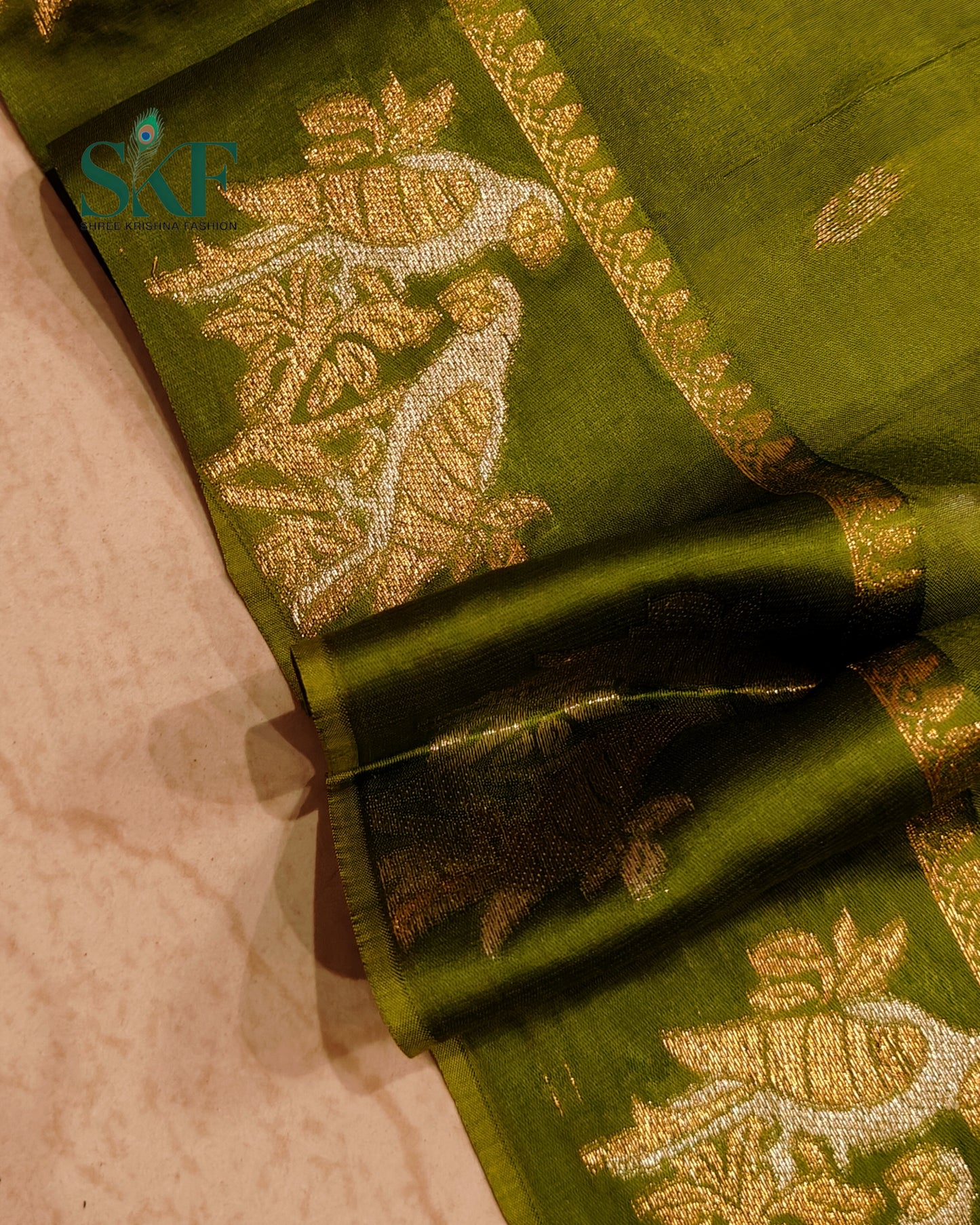 HO SILK PARROT BORDER ZARI BUTTY WEAVING WORK MEHNDI GREEN SAREE BY SKFBHOLUBHAI