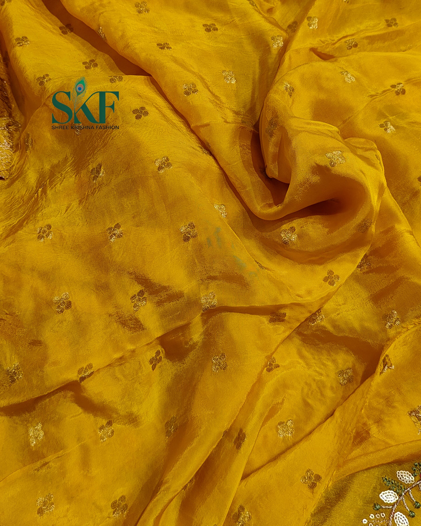 CHINON SEQUENCE EMBROIDERY WEAVING WORK YELLOW SAREE BY SKFBHOLUBHAI