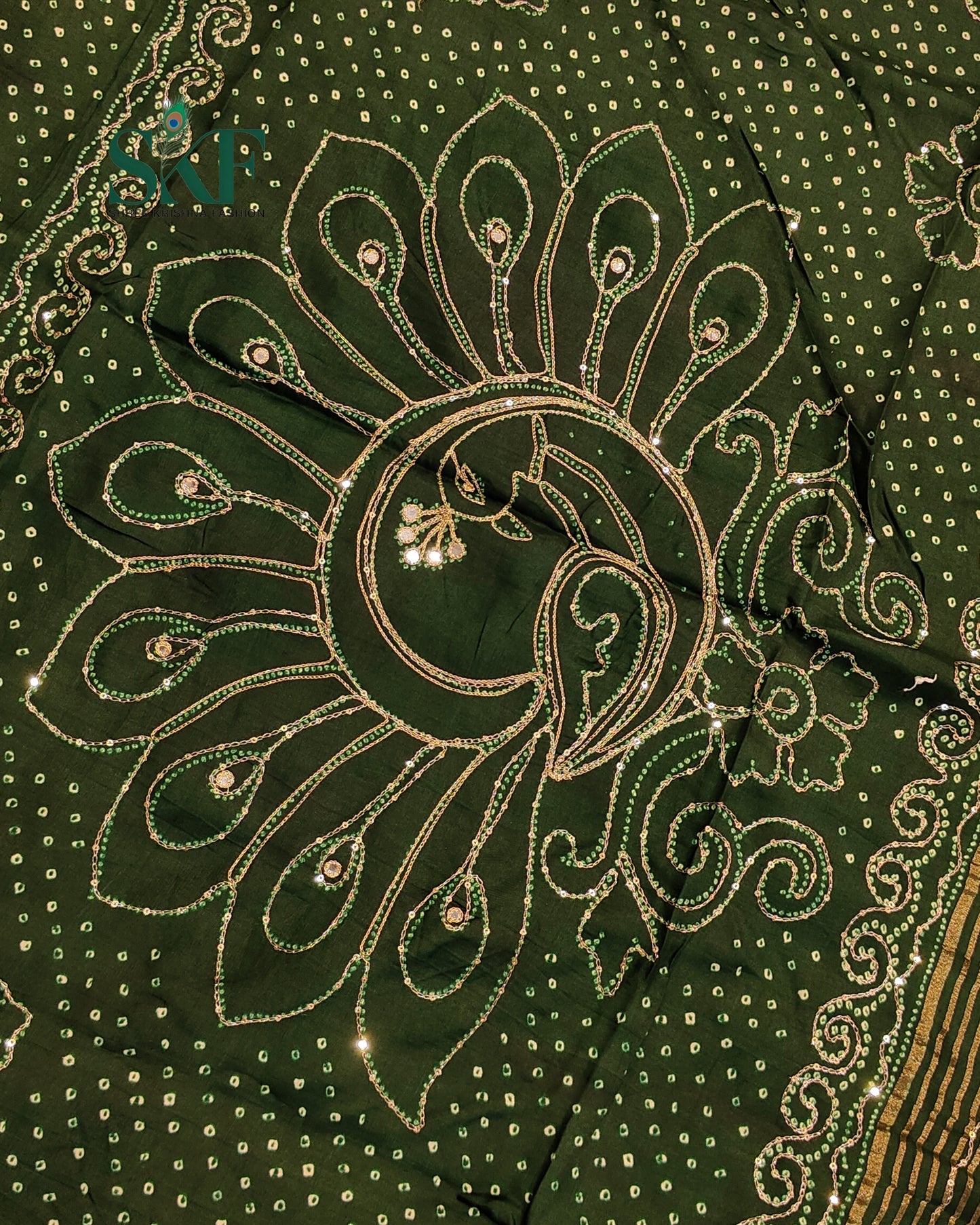 HO SILK BHANDHANI PEACOCK MOTIF AARI AND SEQUENCE WORK BOTTLE GREEN SAREE BY SKFBHOLUBHAI