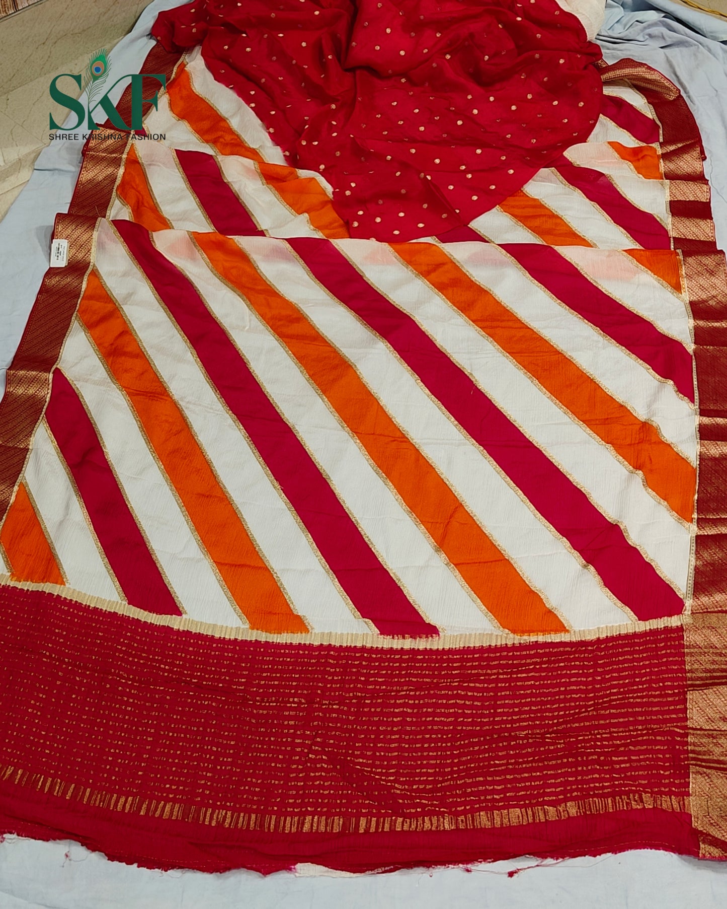 CHINON LEHRIYA EMBROIDERY WEAVING WORK BORDER MULTICOLOUR SAREE BY SKFBHOLUBHAI