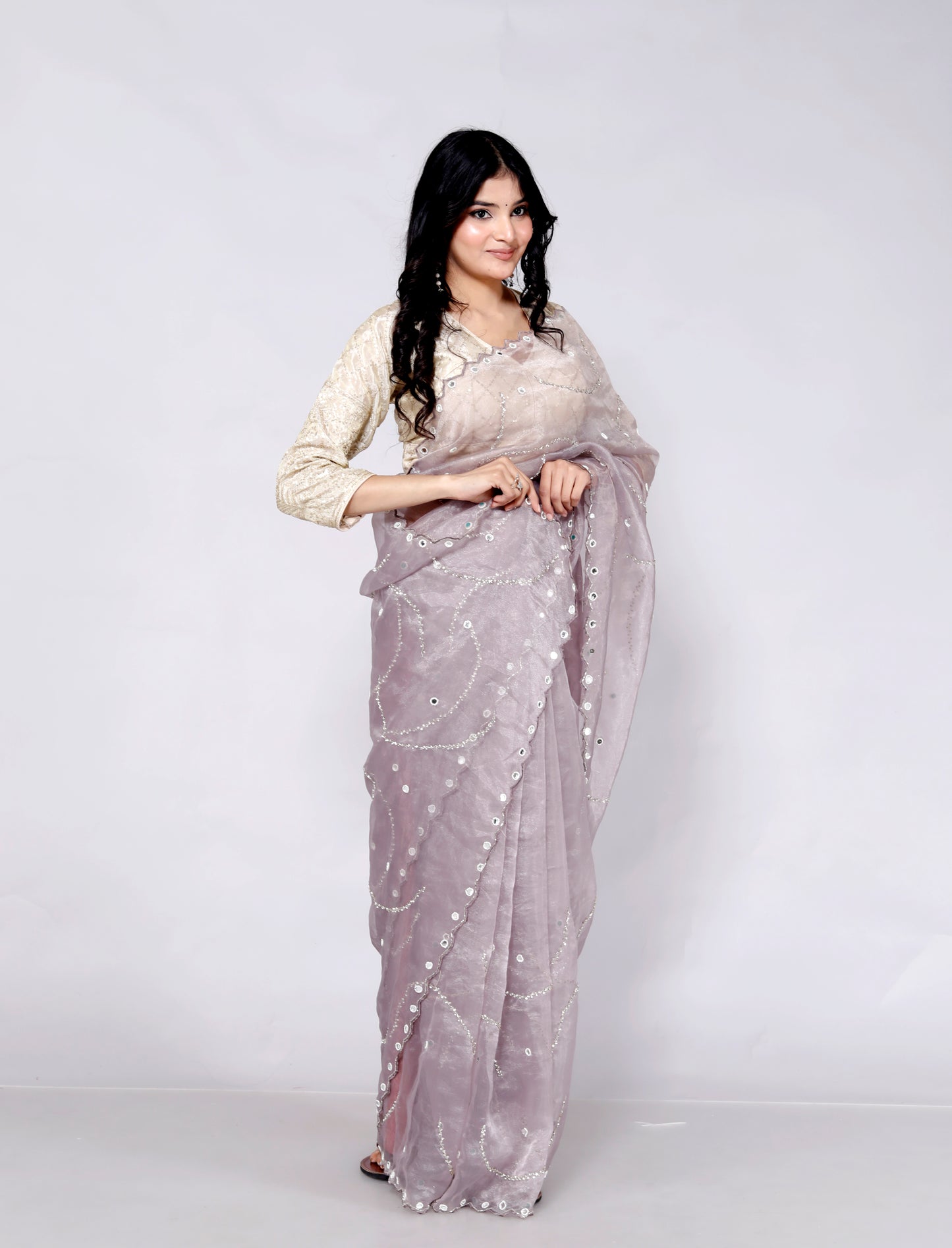 GLOSSY ORGANZA MIRROR AND JERKEN HANDWORK LILAC SAREE BY SKFBHOLUBHAI