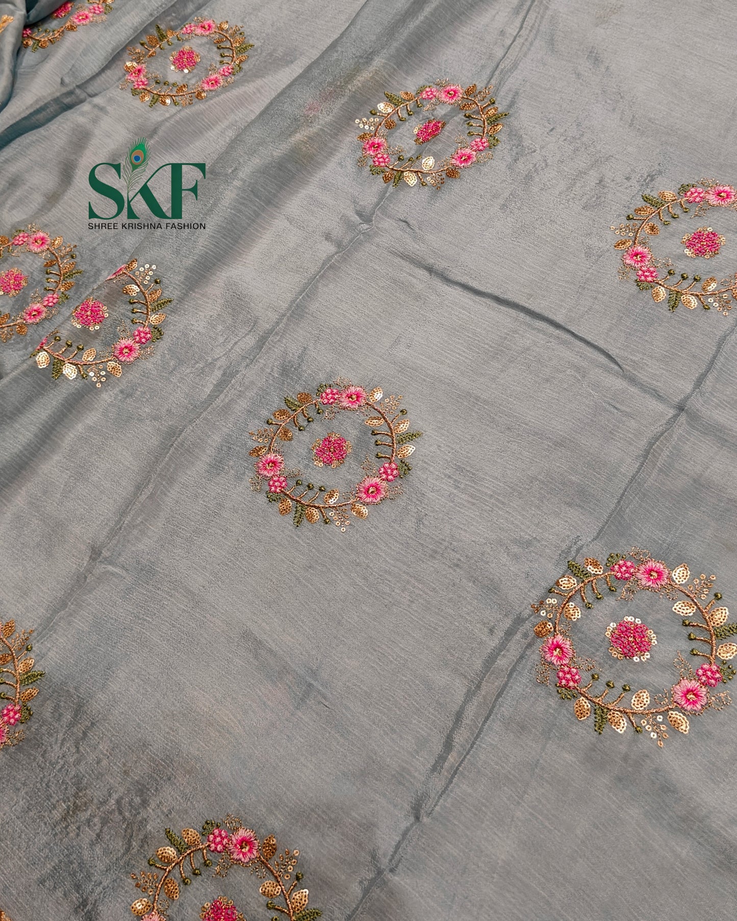 CHINON SEQUENCE EMBROIDERY WEAVING WORK ICE BLUE SAREE BY SKFBHOLUBHAI