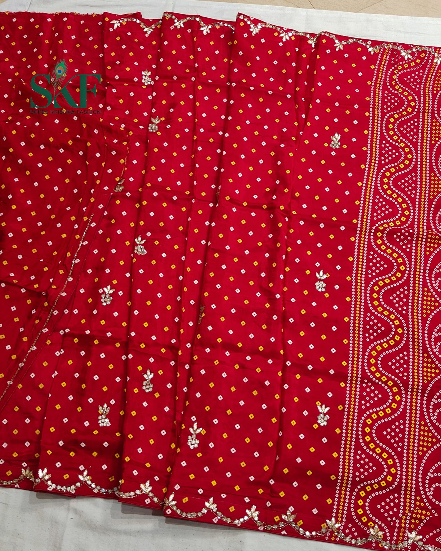 MODAL SILK BHANDHANI HANDWORK BUTTA RED SAREE BY SKFBHOLUBHAI