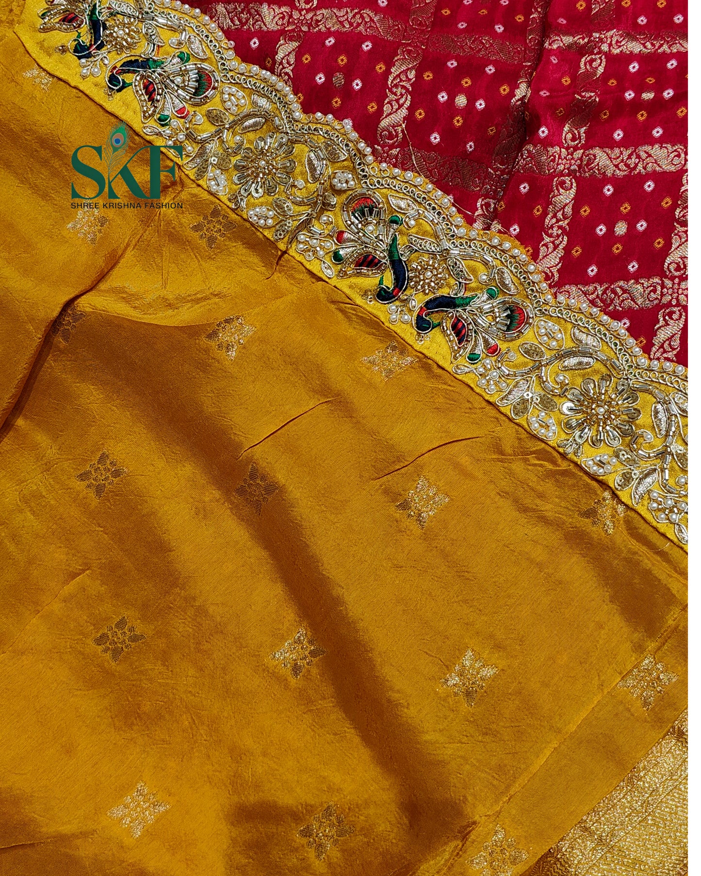 KHADI NEEM JARI GEORGETTE GHATCHOLA BHANDHANI HEAVY WORK BORDER RED SAREE BY SKFBHOLUBHAI