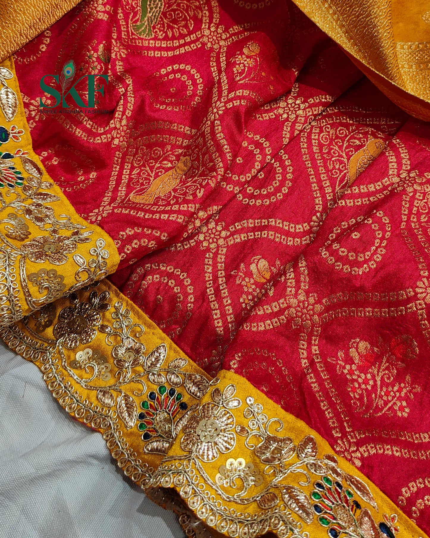 DOLA BANARSI WEAVING BHANDHANI HEAVY WORK BORDER RED SAREE BY SKFBHOLUBHAI