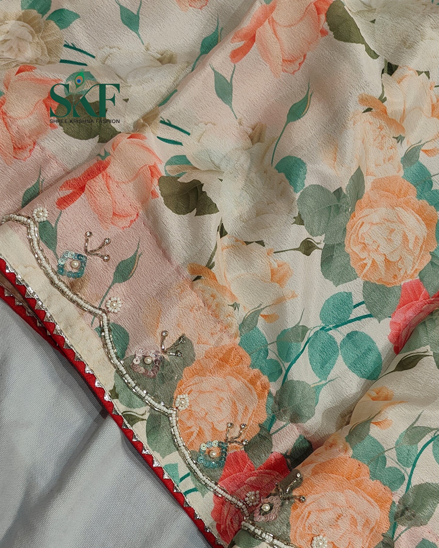CHINON FLORAL DIGITAL PRINT HANDWORK CREAM SAREE BY SKFBHOLUBHAI