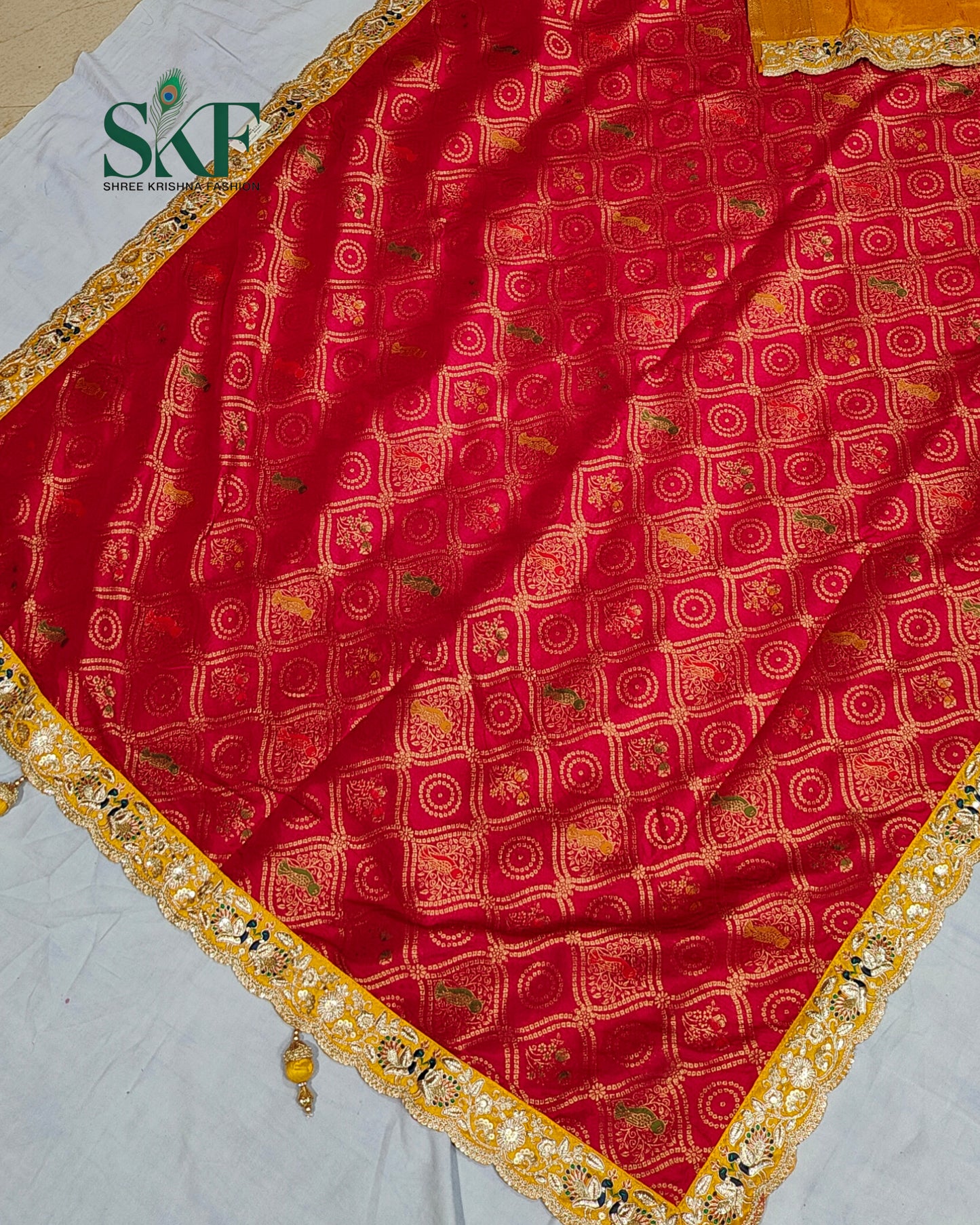 DOLA BANARSI WEAVING BHANDHANI HEAVY WORK BORDER RED SAREE BY SKFBHOLUBHAI