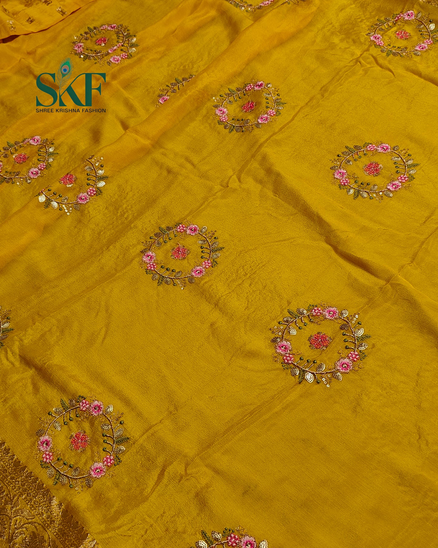 CHINON SEQUENCE EMBROIDERY WEAVING WORK YELLOW SAREE BY SKFBHOLUBHAI