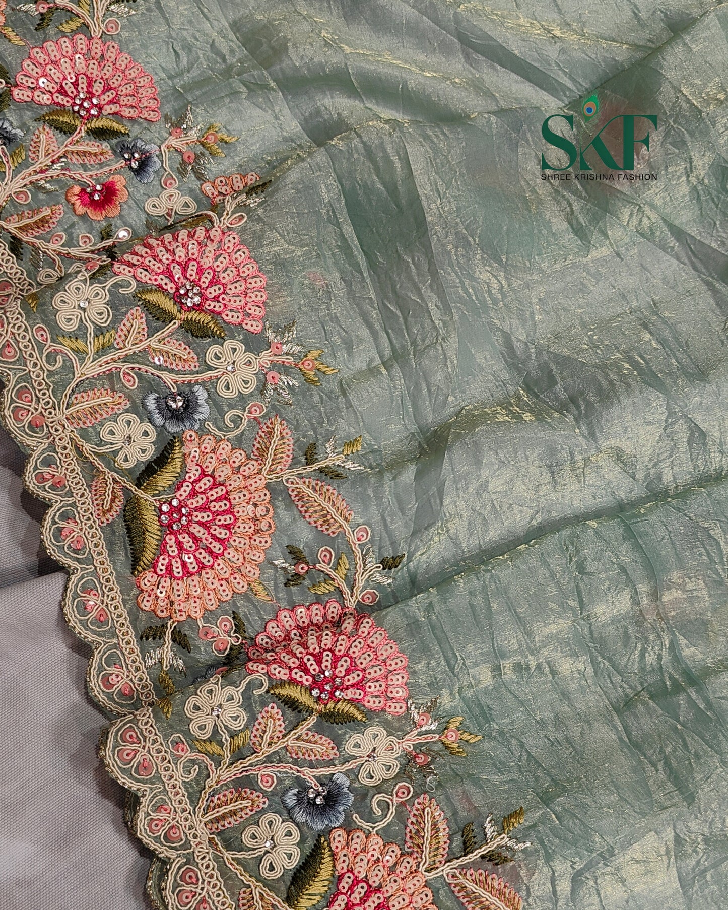 CRUSH TISSUE SIPPI SEQUENCE EMBROIDERY WORK SEEGREEN SAREE BY SKFBHOLUBHAI