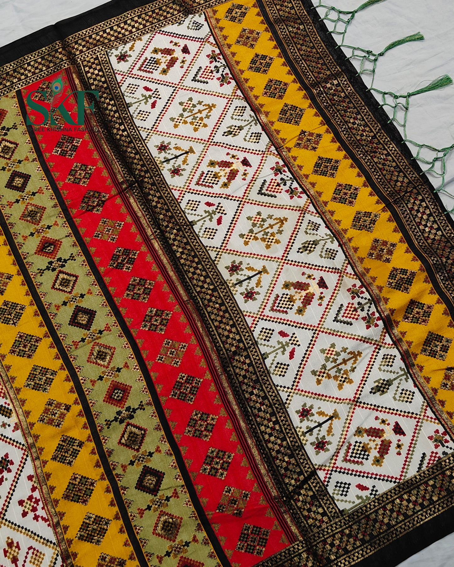MAURA SILK PATOLA FOIL PRINT WEAVING IVORY SAREE BY SKFBHOLUBHAI