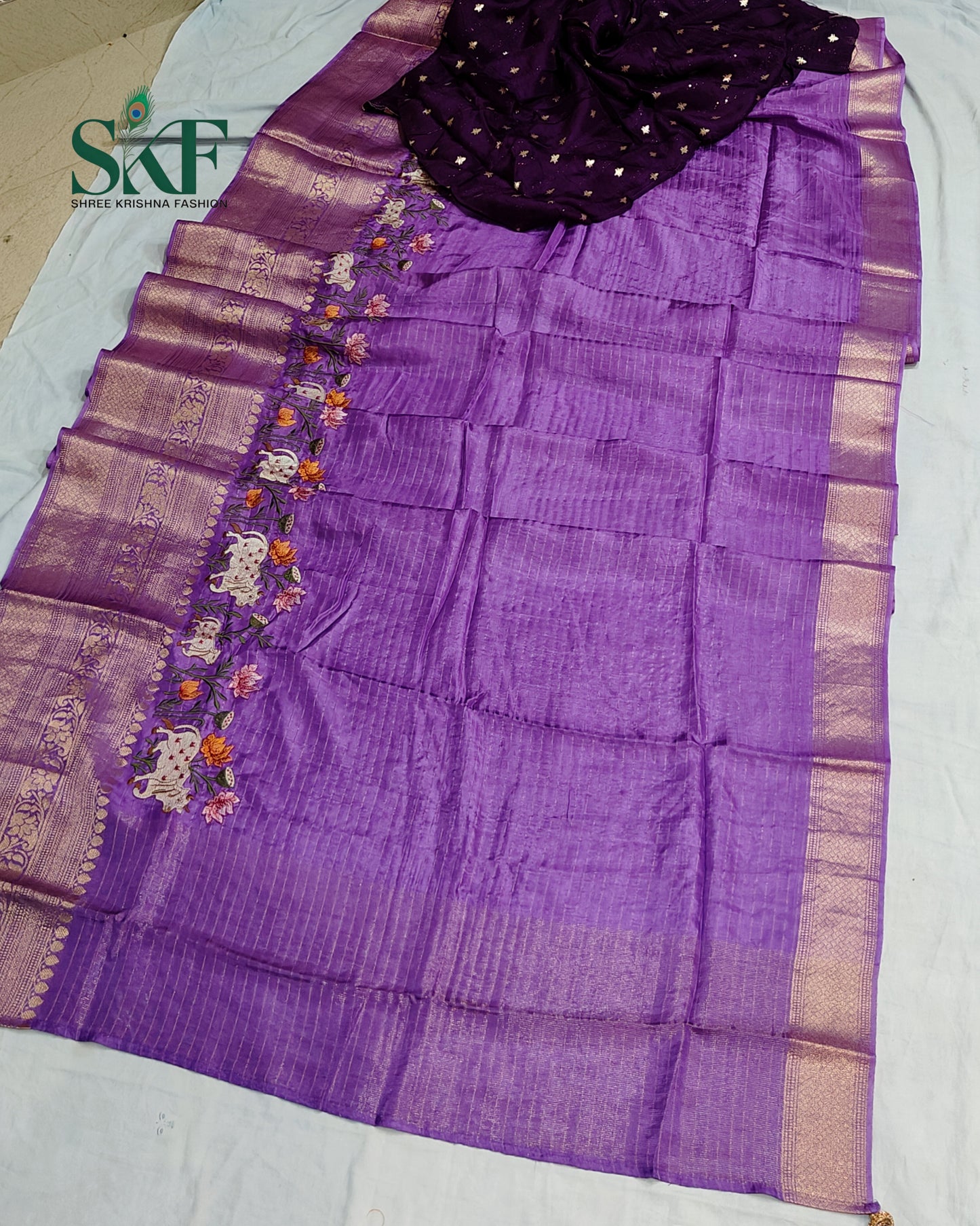 DOLA SILK MOTIF EMBROIDERY PANEL WEAVING BORDER WORK LAVENDER SAREE BY SKFBHOLUBHAI