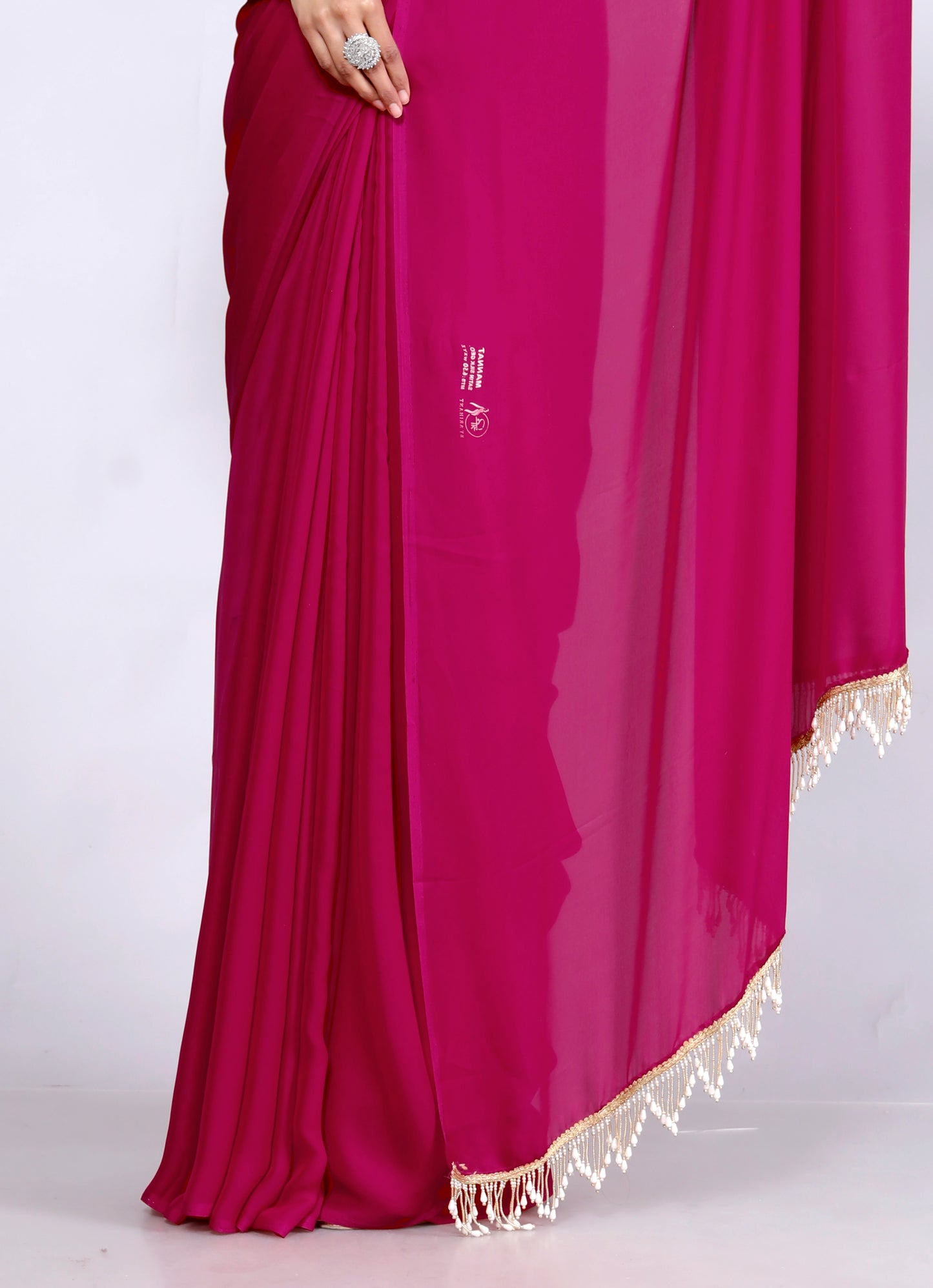 CREPE PLAIN TASSELS WORK RANI PINK SAREE BY SKFBHOLUBHAI